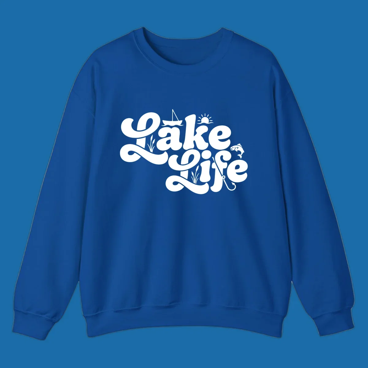 Retro Lake Life script design featuring a sailboat, sun, fish, and fishing hook.