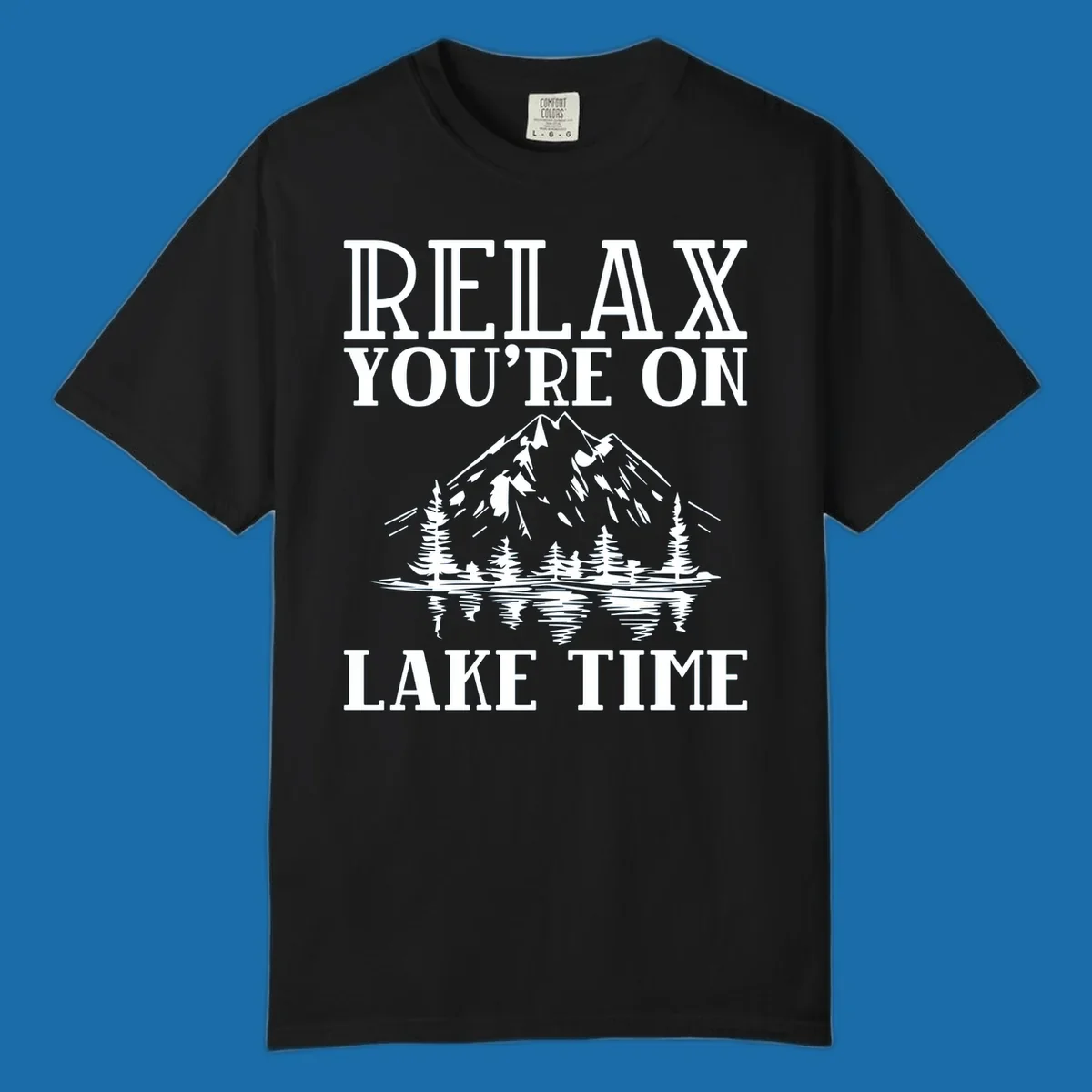 Relax You're On Lake Time text with mountains, trees, and lake reflection.