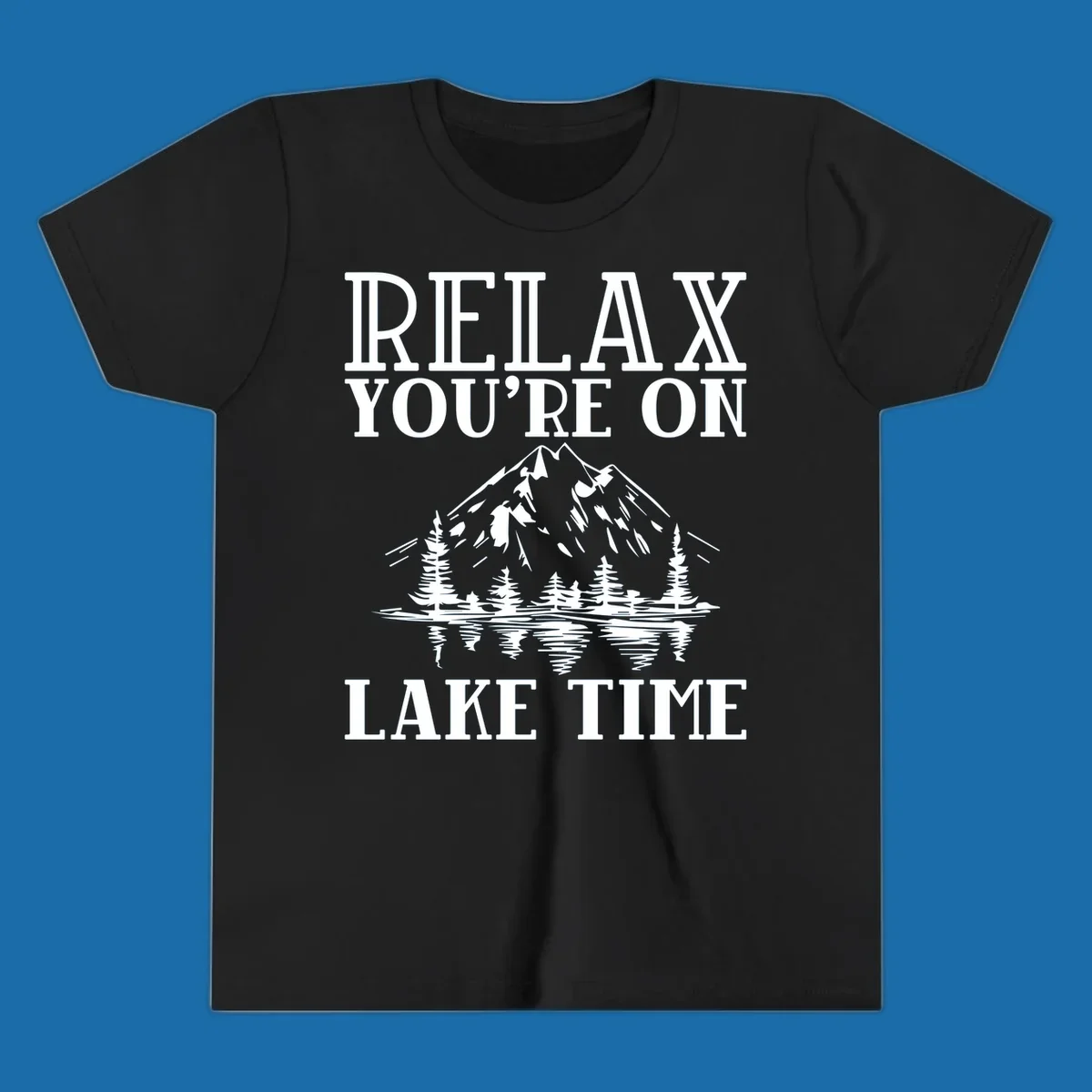 Relax You're On Lake Time text with mountains, trees, and lake reflection.