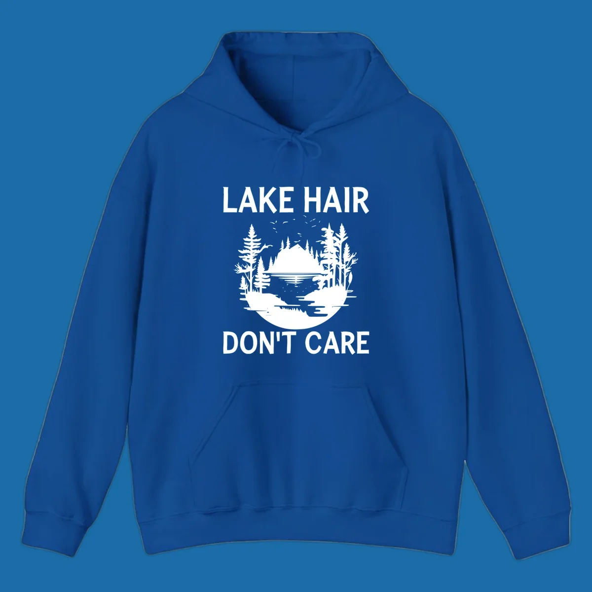 Lake Hair Don't Care design featuring a silhouette of a lake, trees, and mountains.