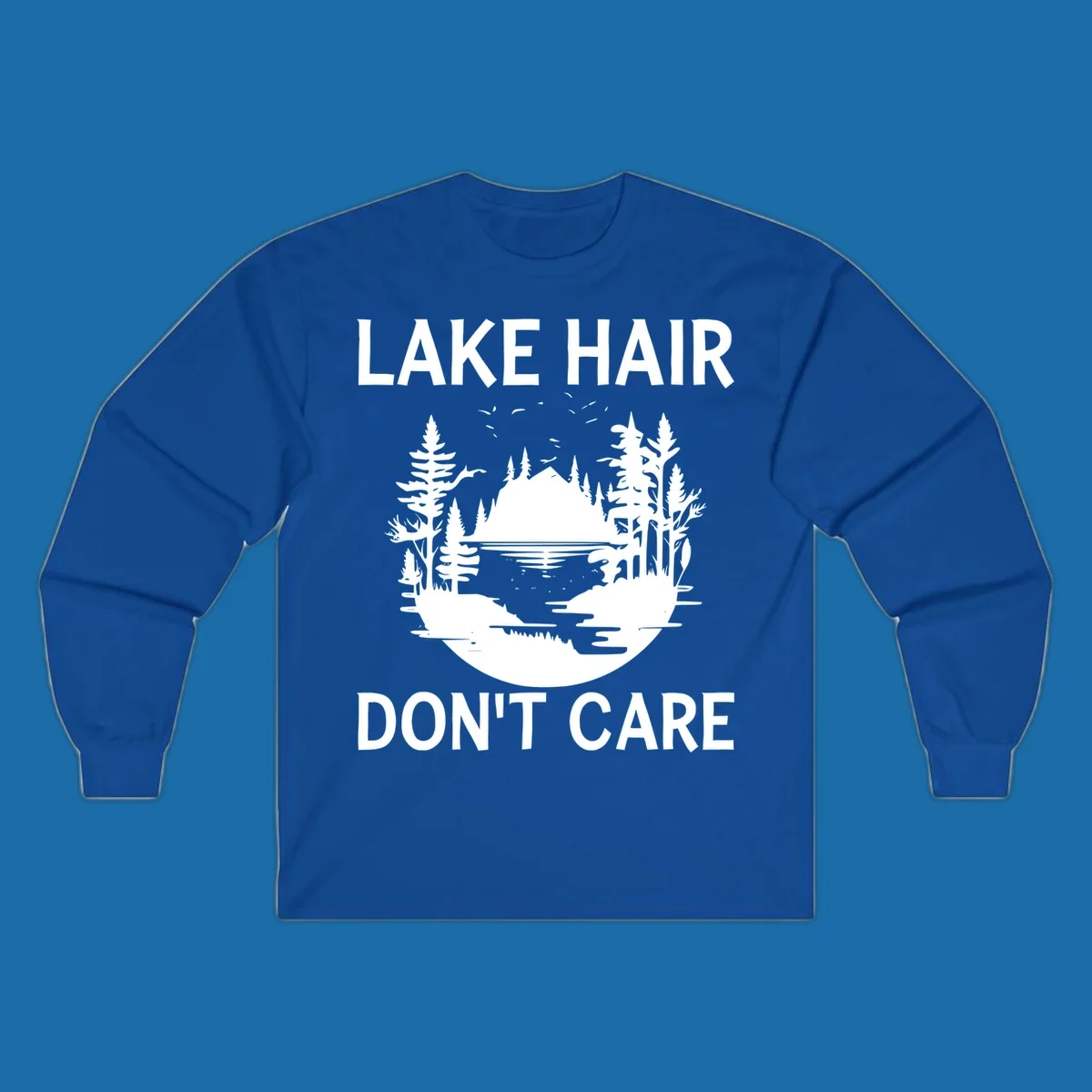 Lake Hair Don't Care design featuring a silhouette of a lake, trees, and mountains.