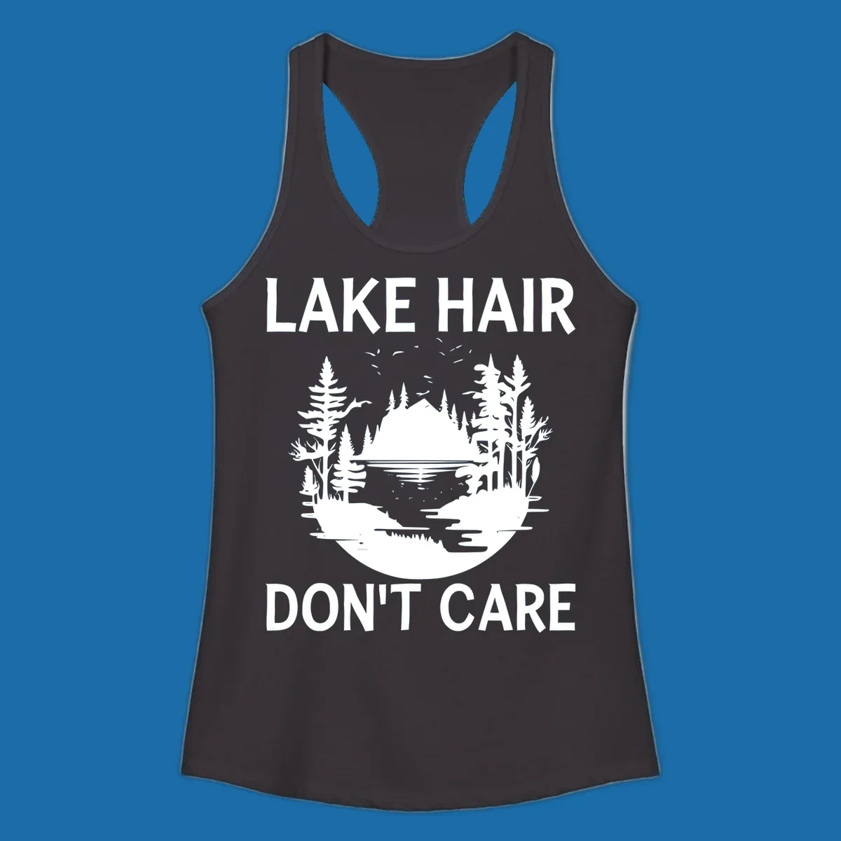 Lake Hair Don't Care design featuring a silhouette of a lake, trees, and mountains.