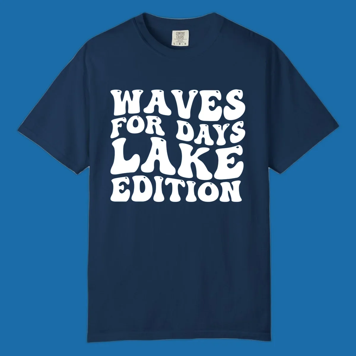 Retro bubbly white text: Waves For Days Lake Edition on black background.