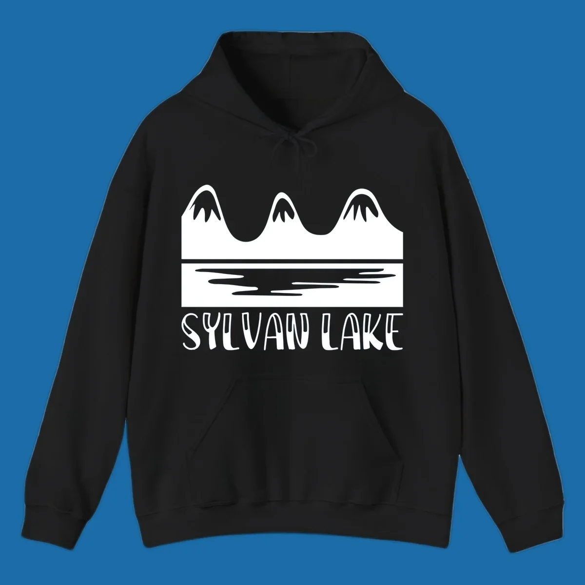 Sylvan Lake mountains reflected in water, with text 'SYLVAN LAKE'.
