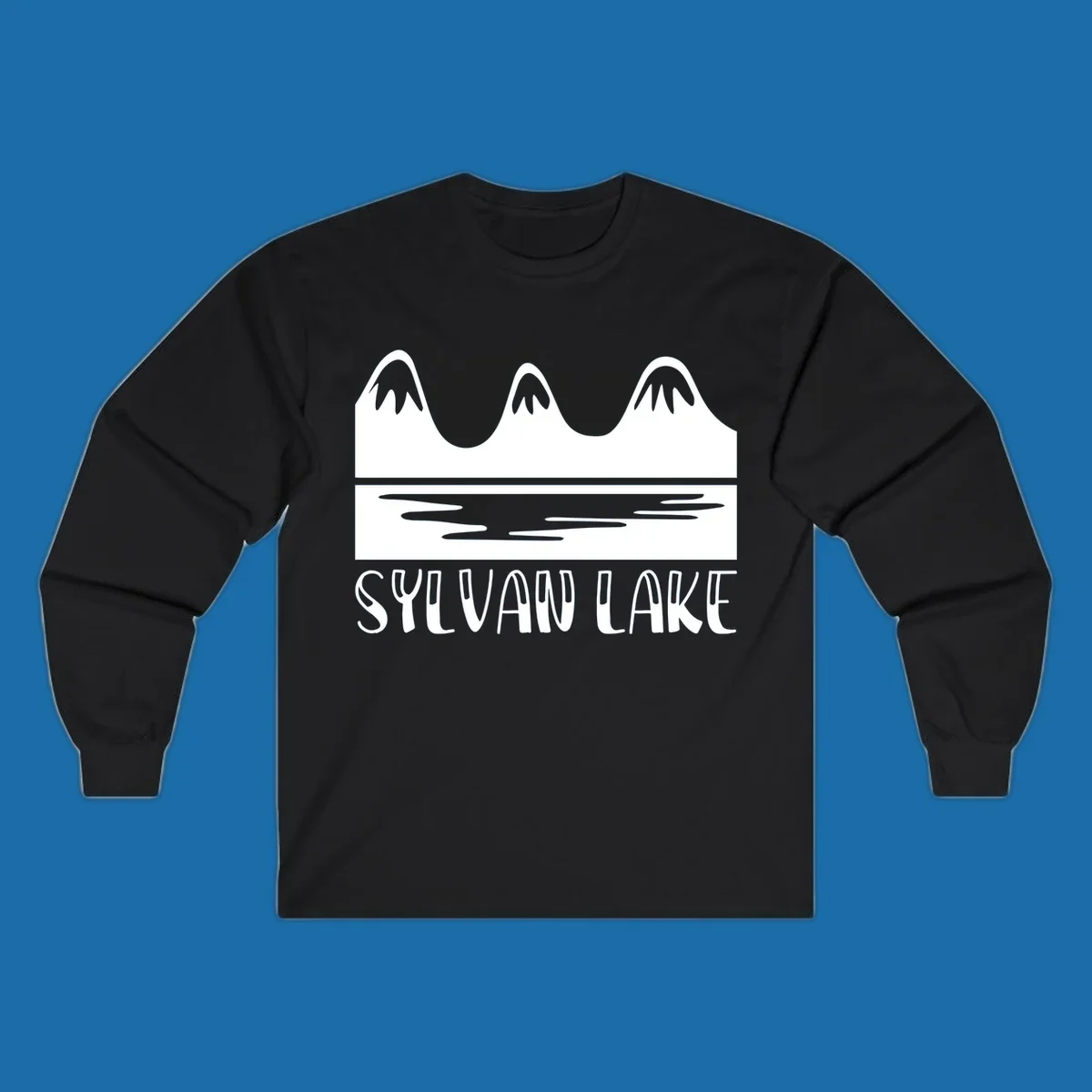 Sylvan Lake mountains reflected in water, with text 'SYLVAN LAKE'.