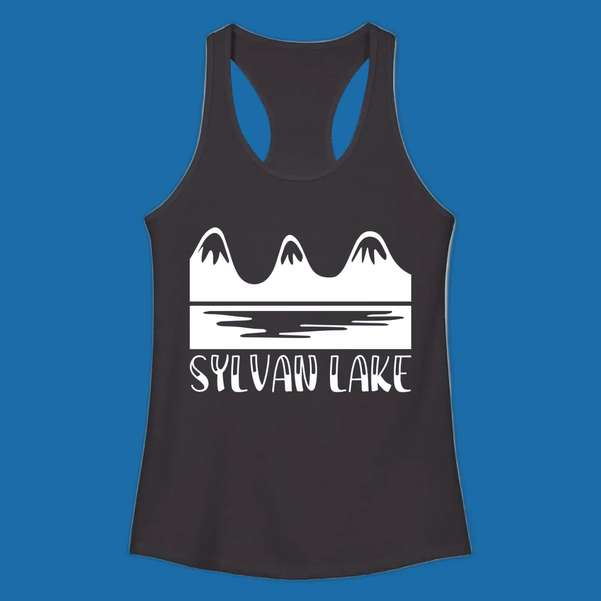 Sylvan Lake mountains reflected in water, with text 'SYLVAN LAKE'.