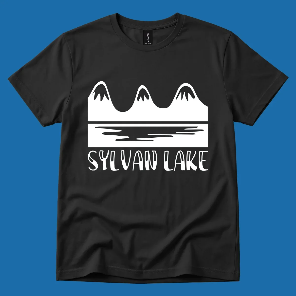 Sylvan Lake mountains reflected in water, with text 'SYLVAN LAKE'.