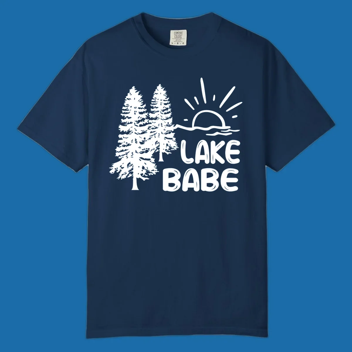 White graphic of pine trees, sun rising over water, and text 'LAKE BABE' on a black background.