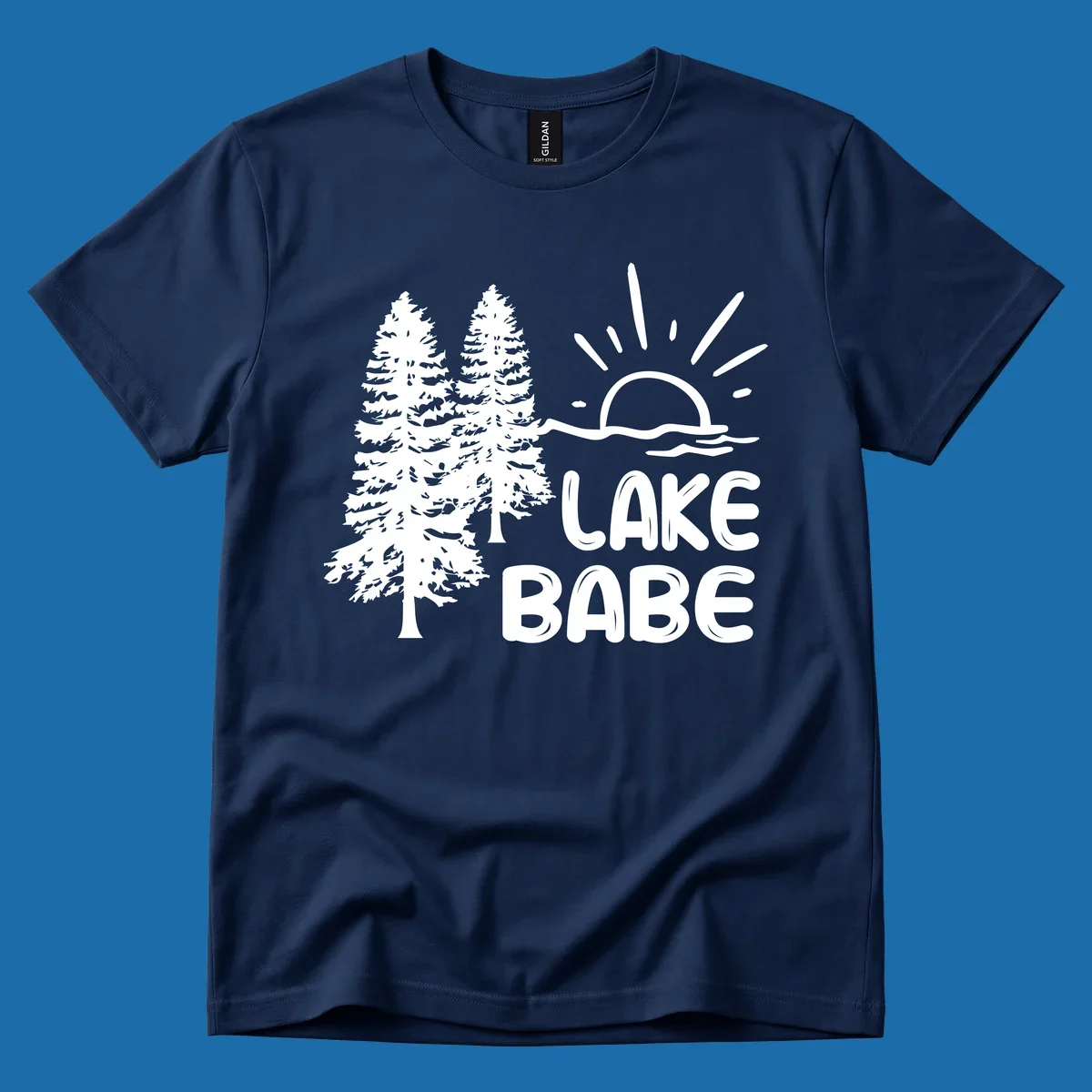 White graphic of pine trees, sun rising over water, and text 'LAKE BABE' on a black background.