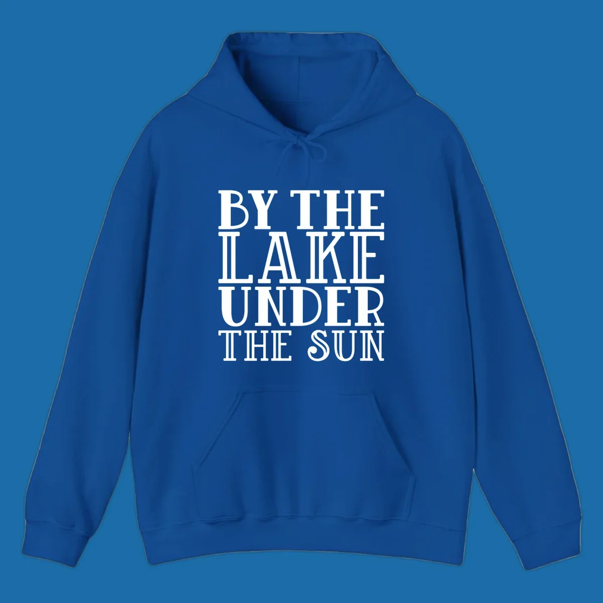 Text design 'BY THE LAKE UNDER THE SUN' in white serif font.