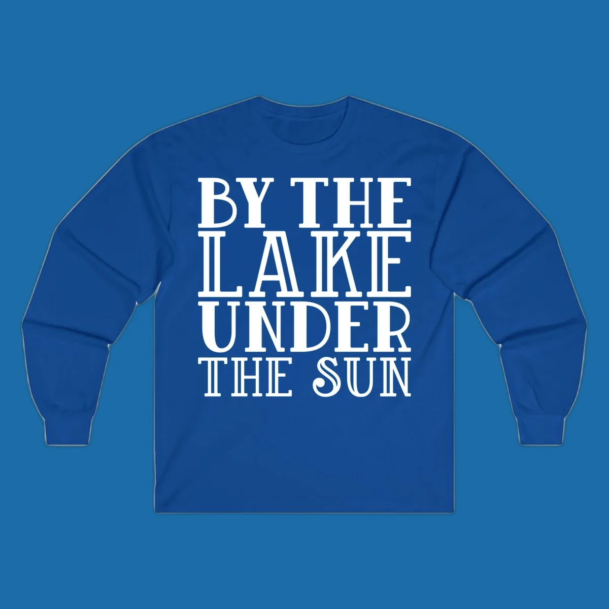 Text design 'BY THE LAKE UNDER THE SUN' in white serif font.