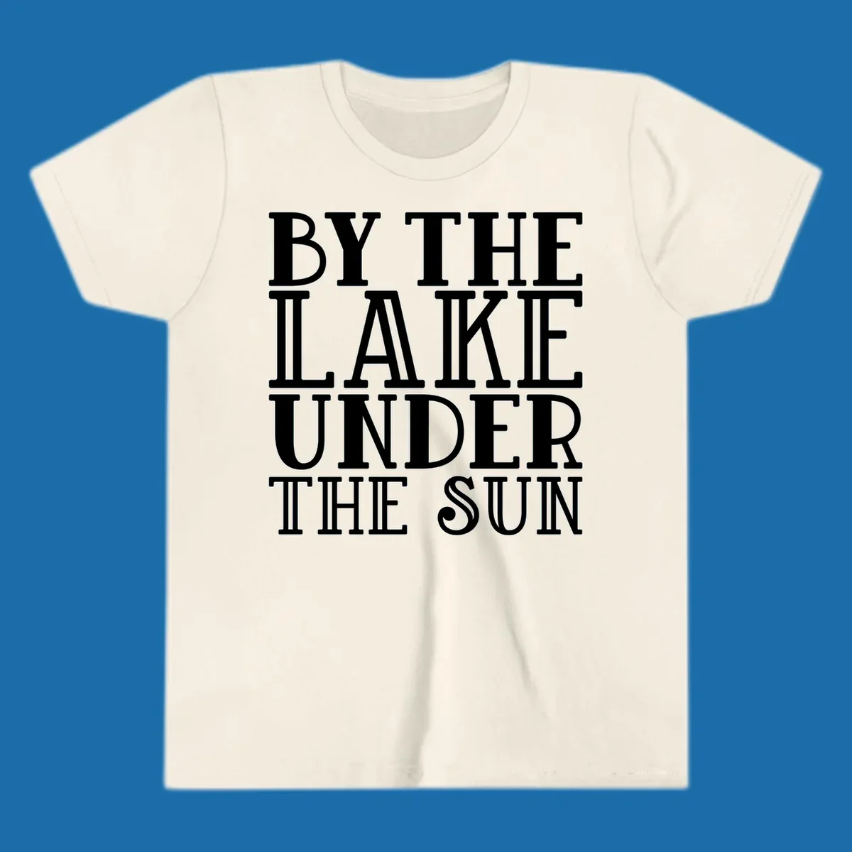 Text design 'BY THE LAKE UNDER THE SUN' in white serif font.