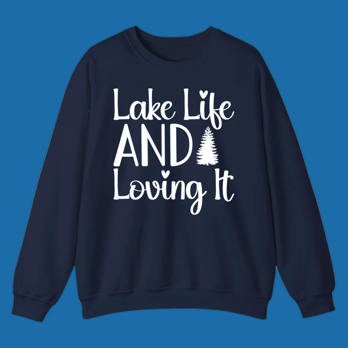 Lake Life And Loving It text with pine tree and heart graphics.