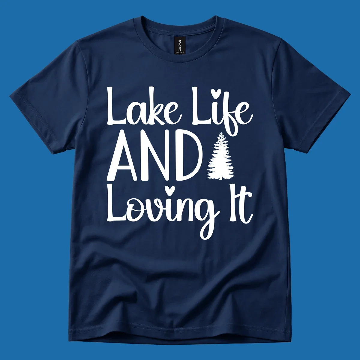 Lake Life And Loving It text with pine tree and heart graphics.