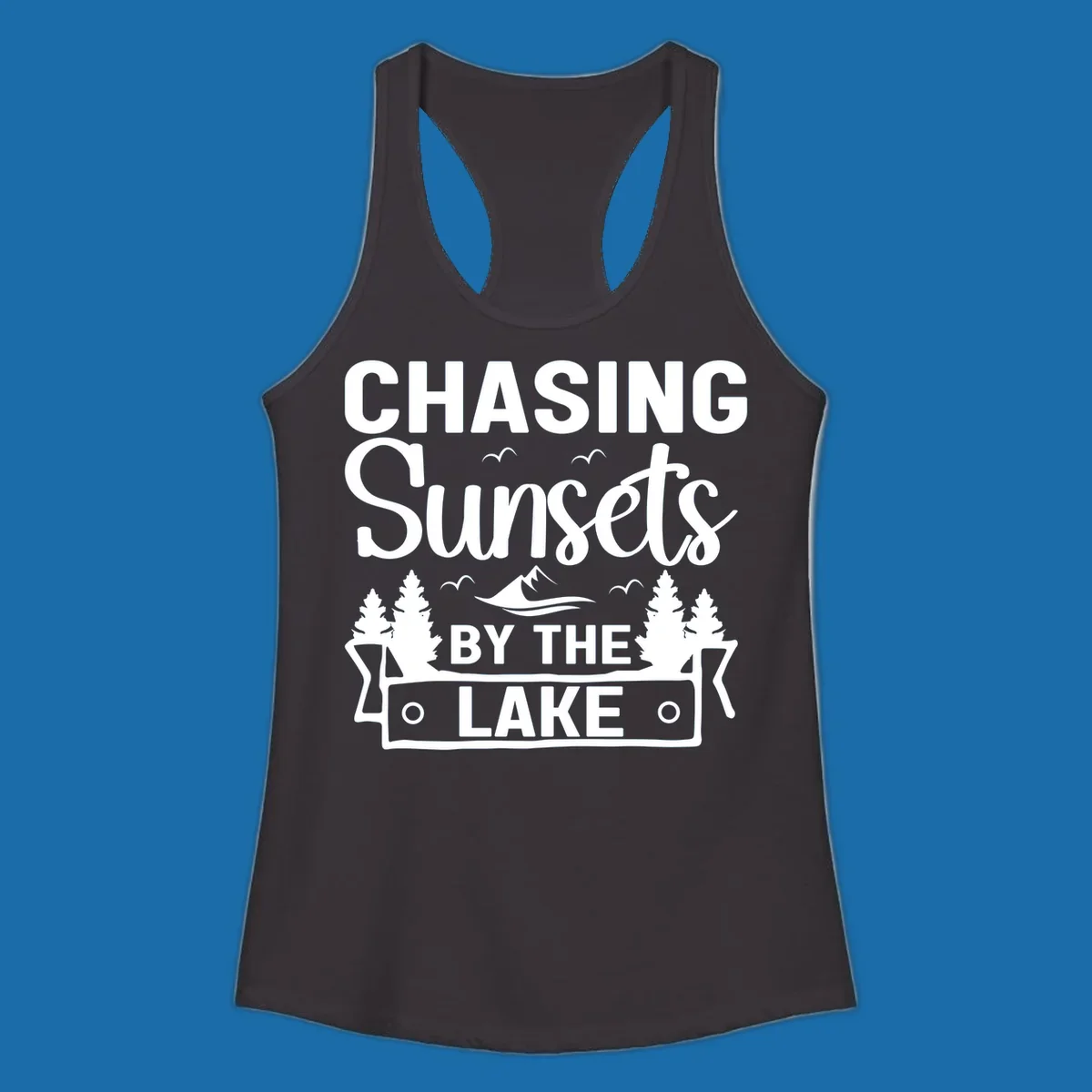 Chasing sunsets by the lake design with text, trees, mountains, and birds.