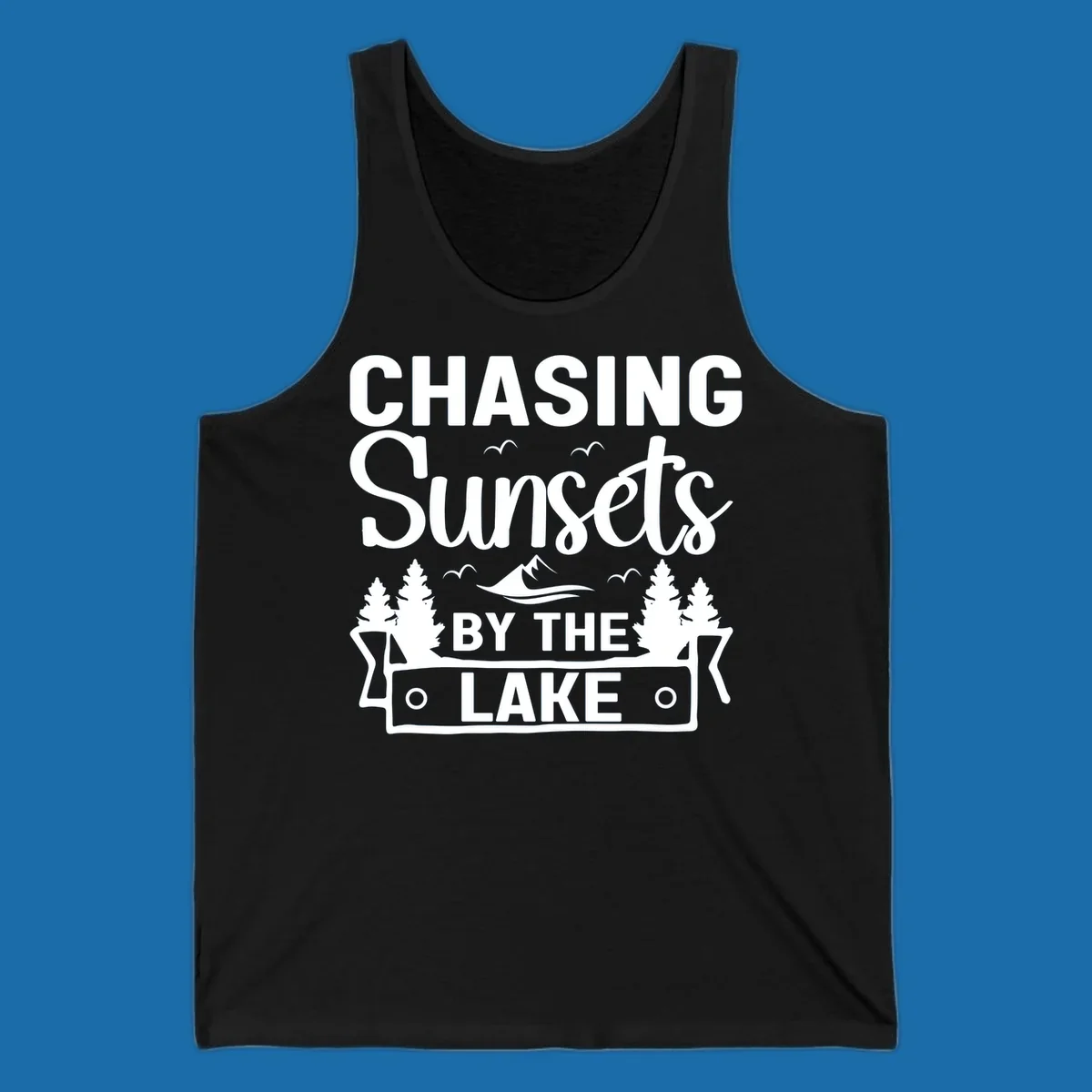 Chasing sunsets by the lake design with text, trees, mountains, and birds.
