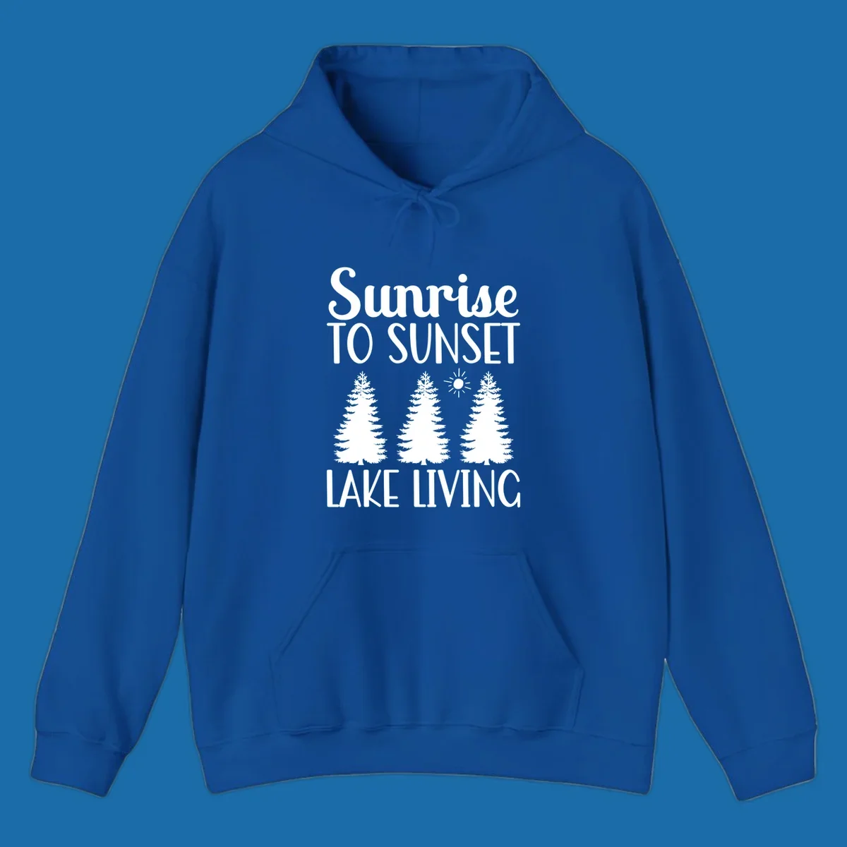 Sunrise to sunset lake living text with pine trees and sun graphic. lake-living-sunrise-sunset