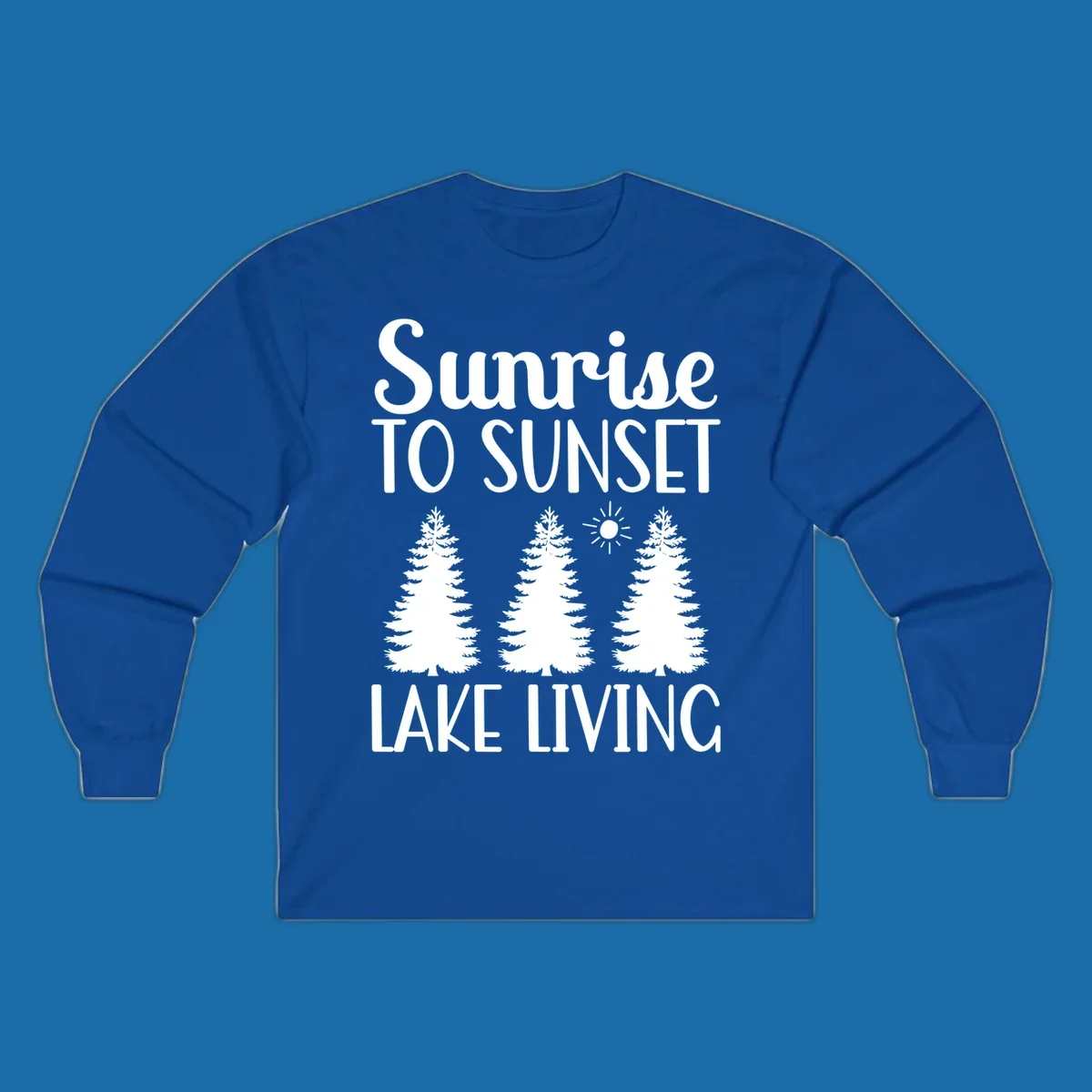 Sunrise to sunset lake living text with pine trees and sun graphic. lake-living-sunrise-sunset