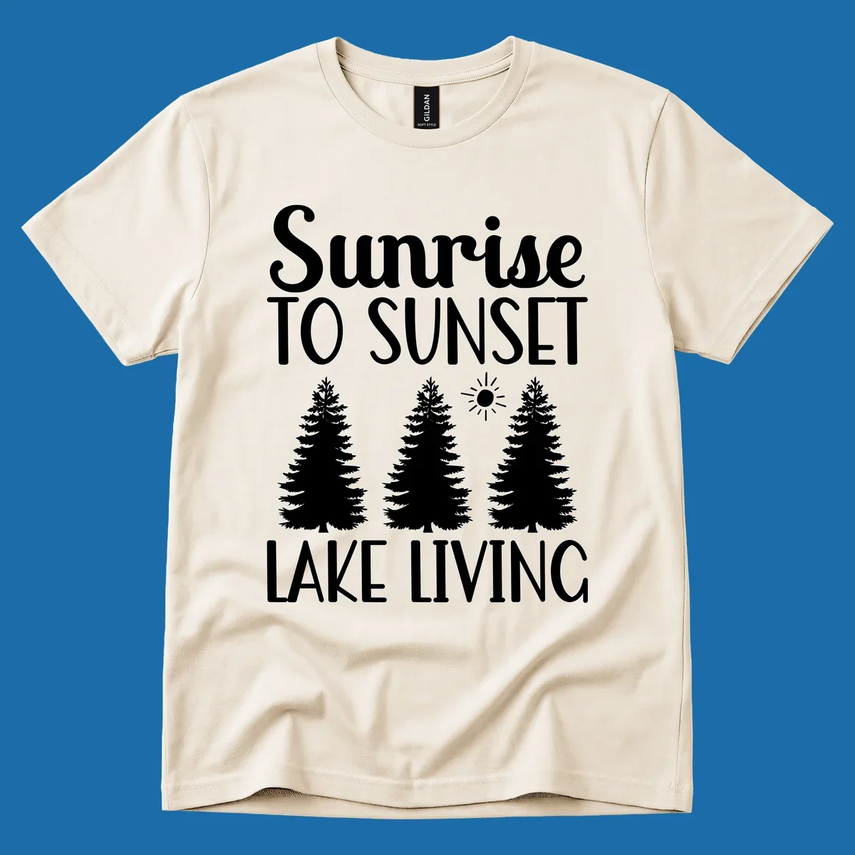 Sunrise to sunset lake living text with pine trees and sun graphic. lake-living-sunrise-sunset