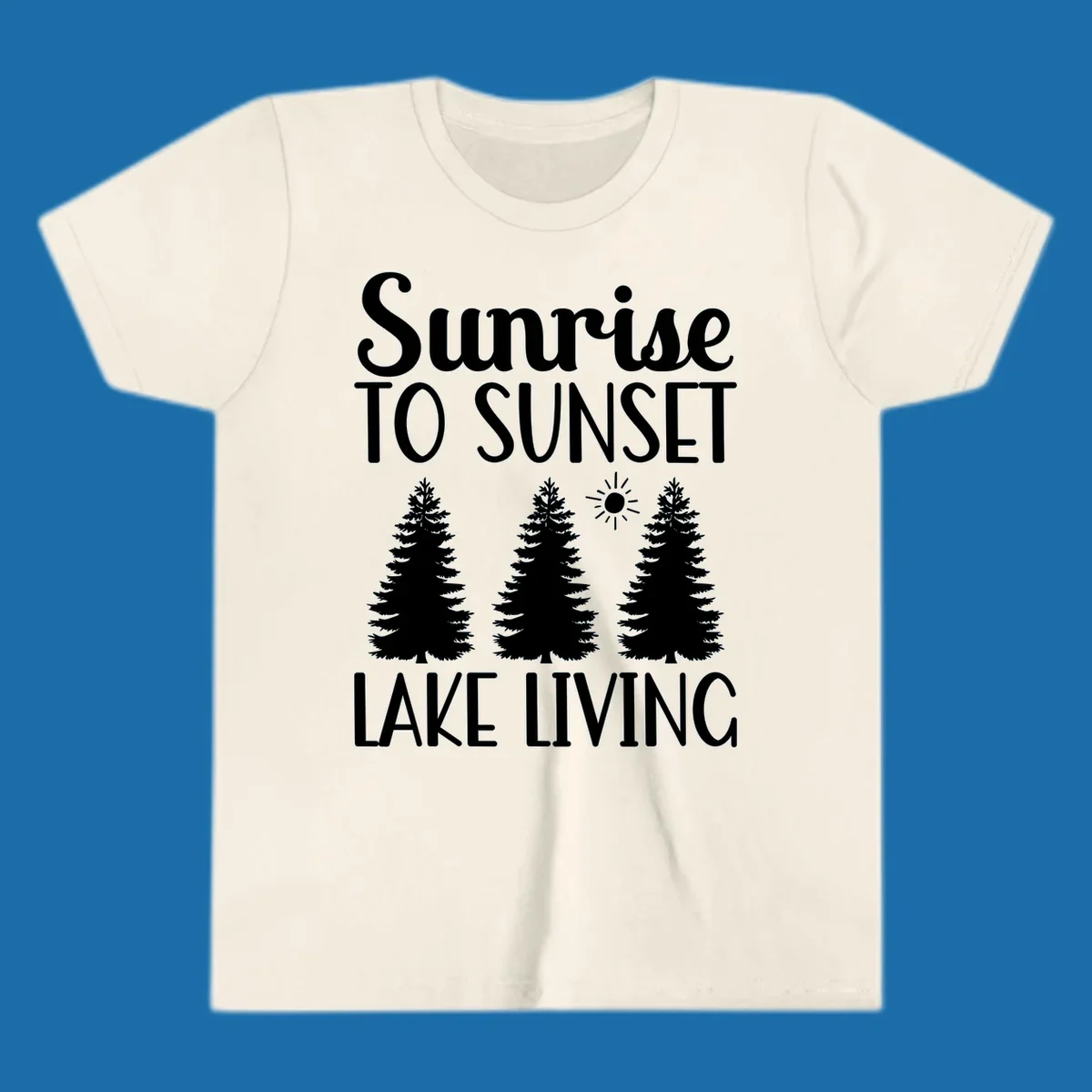 Sunrise to sunset lake living text with pine trees and sun graphic. lake-living-sunrise-sunset