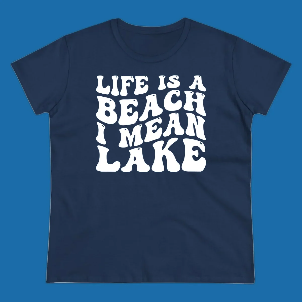 Retro typography design with the phrase "LIFE IS A BEACH I MEAN LAKE" for lake-themed apparel.