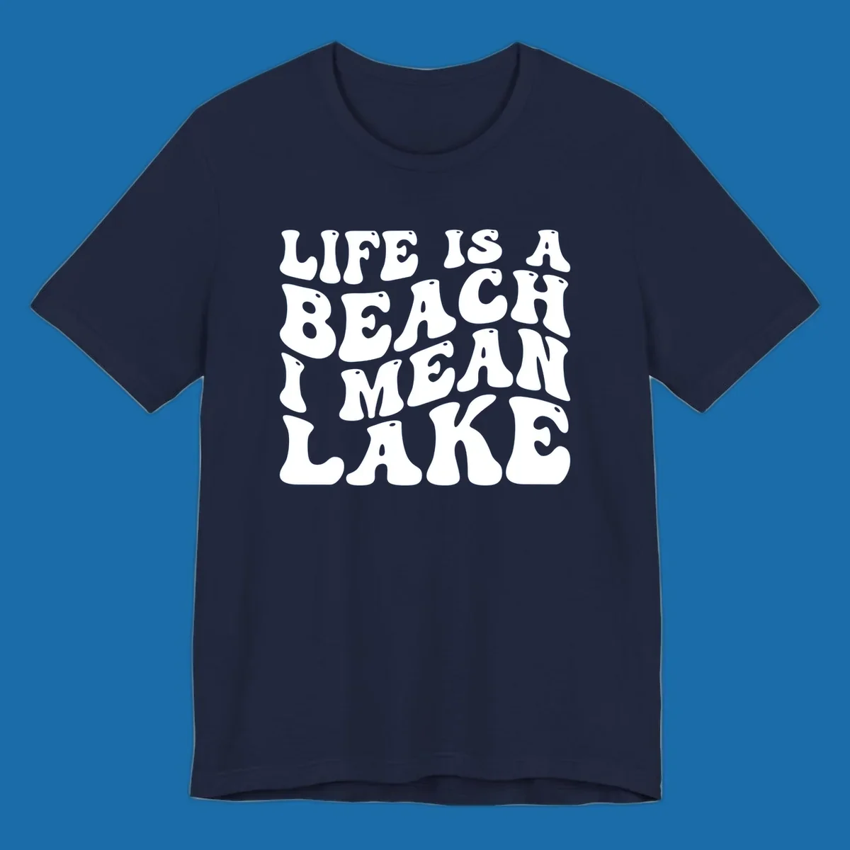 Retro typography design with the phrase "LIFE IS A BEACH I MEAN LAKE" for lake-themed apparel.