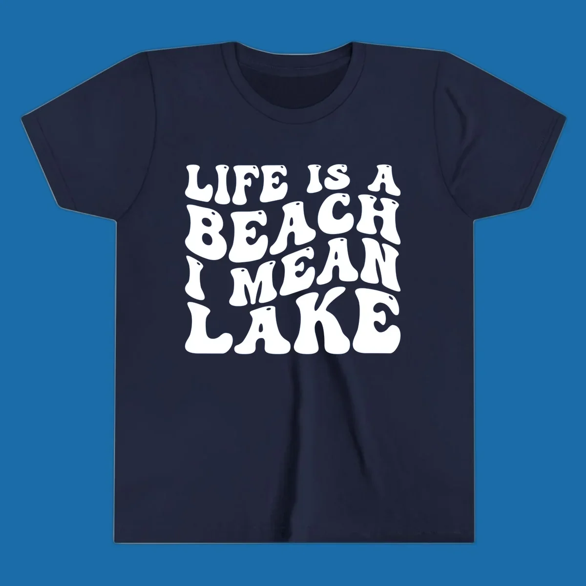 Retro typography design with the phrase "LIFE IS A BEACH I MEAN LAKE" for lake-themed apparel.