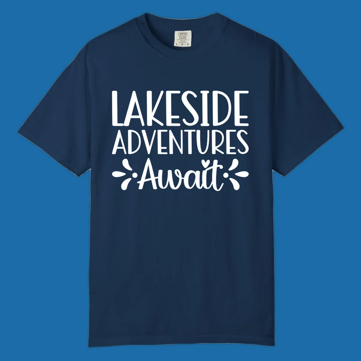 Lakeside adventures await text design with floral accents and a heart.
