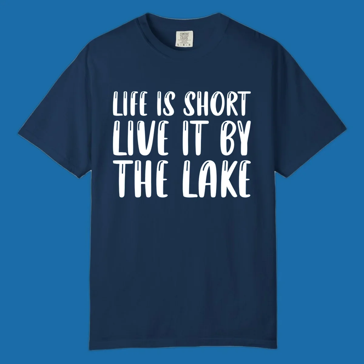 Bold white text "Life Is Short Live It By The Lake" for live-by-the-lake shirt.