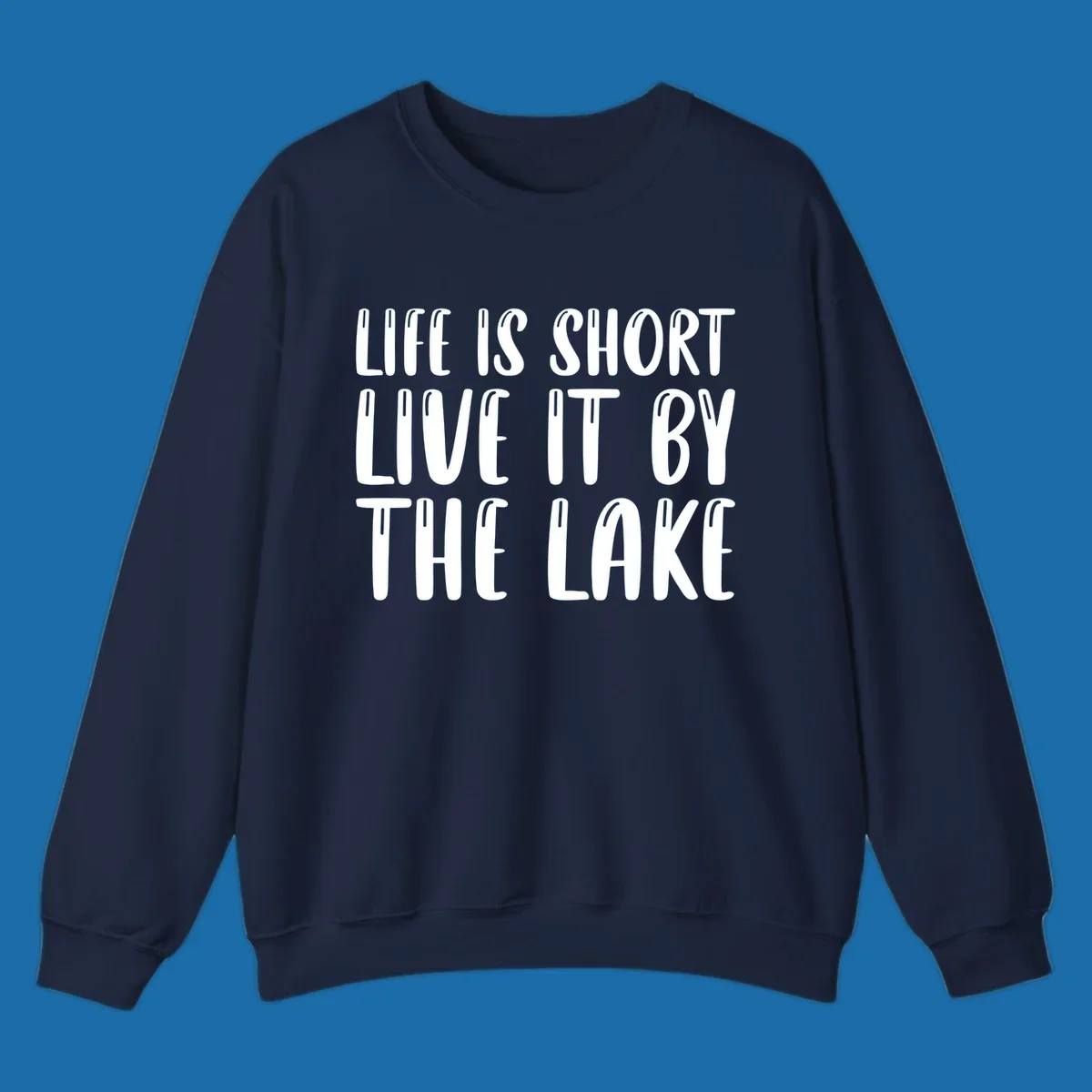 Bold white text "Life Is Short Live It By The Lake" for live-by-the-lake shirt.