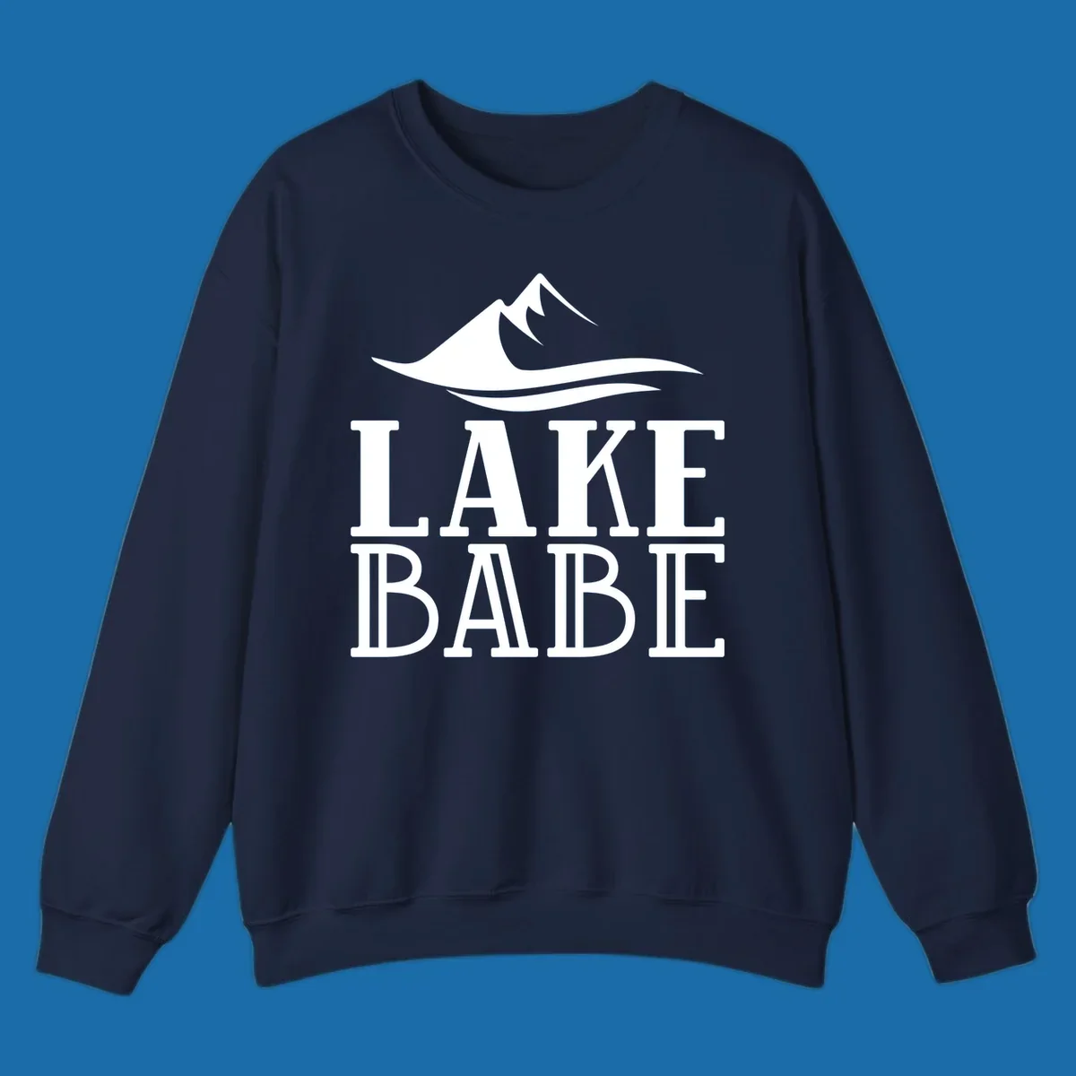 Lake Babe mountain wave graphic design with white text and illustration.