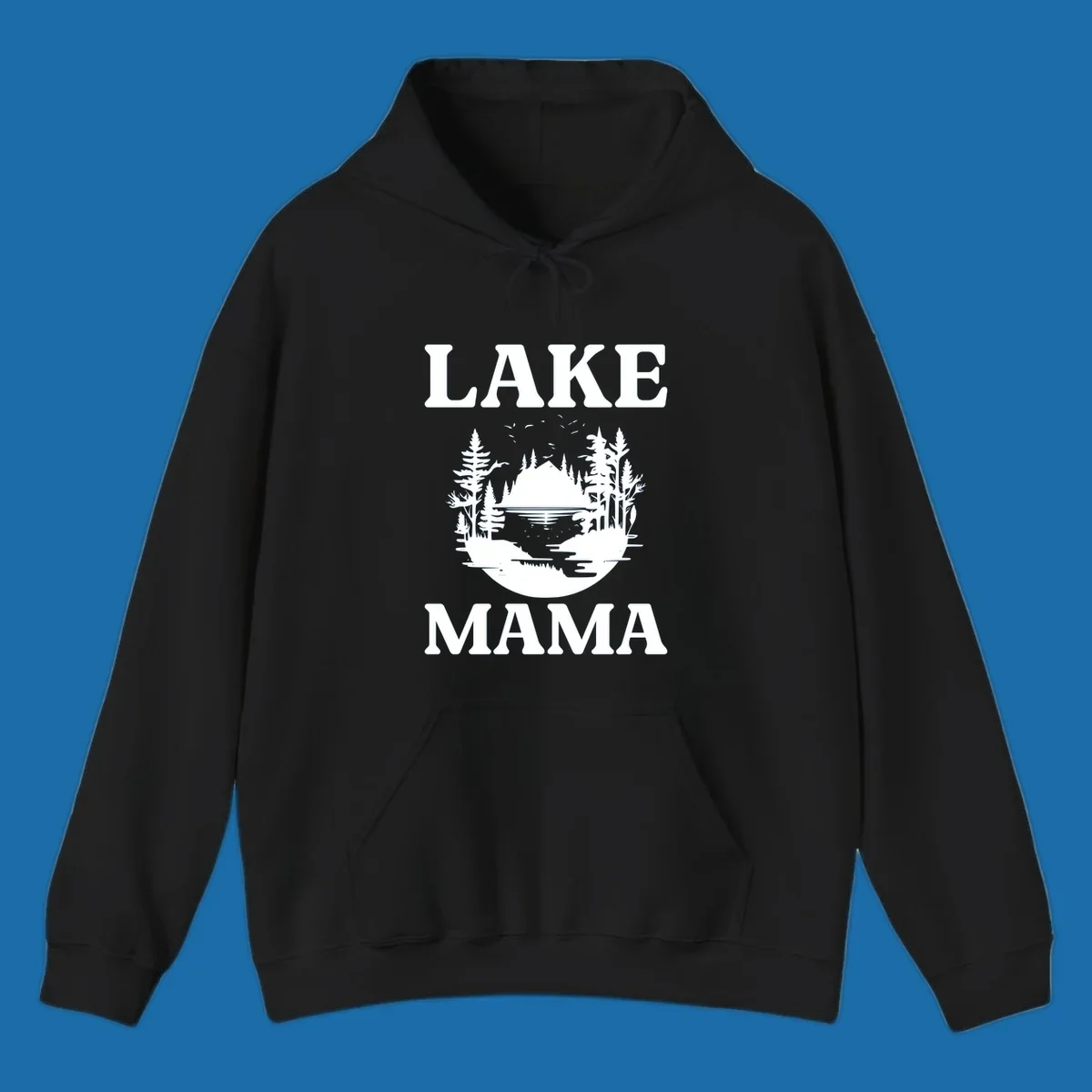 Lake Mama nature scene with trees, lake, and mountains silhouette.