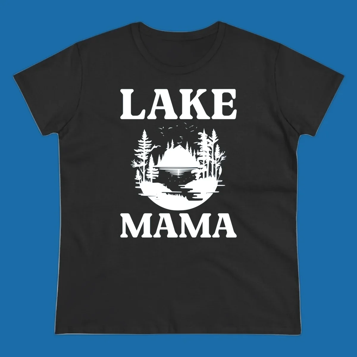 Lake Mama nature scene with trees, lake, and mountains silhouette.