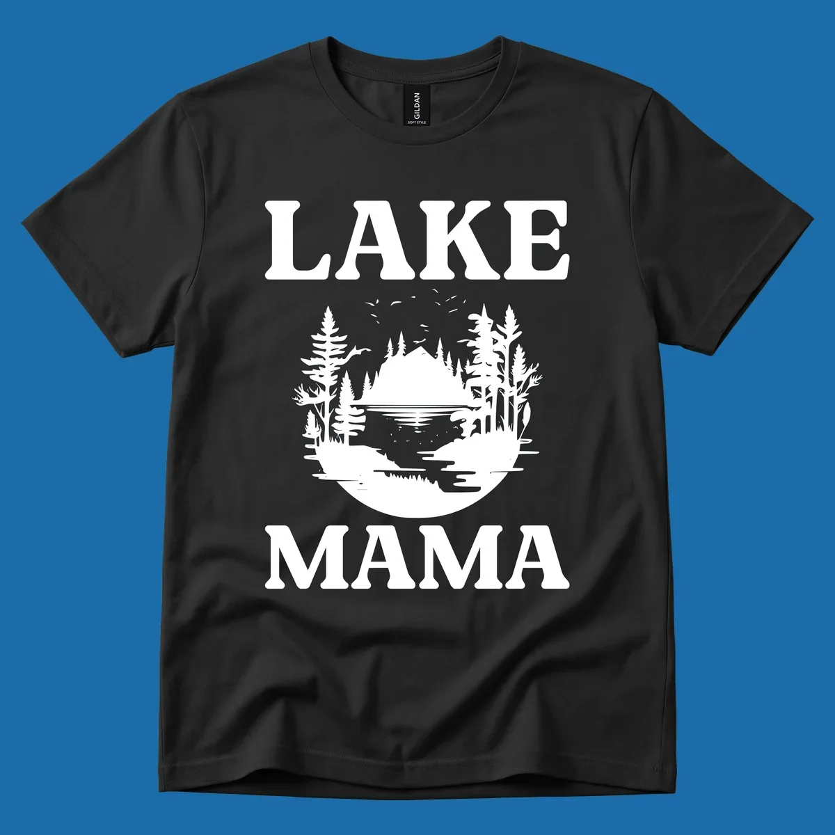 Lake Mama nature scene with trees, lake, and mountains silhouette.