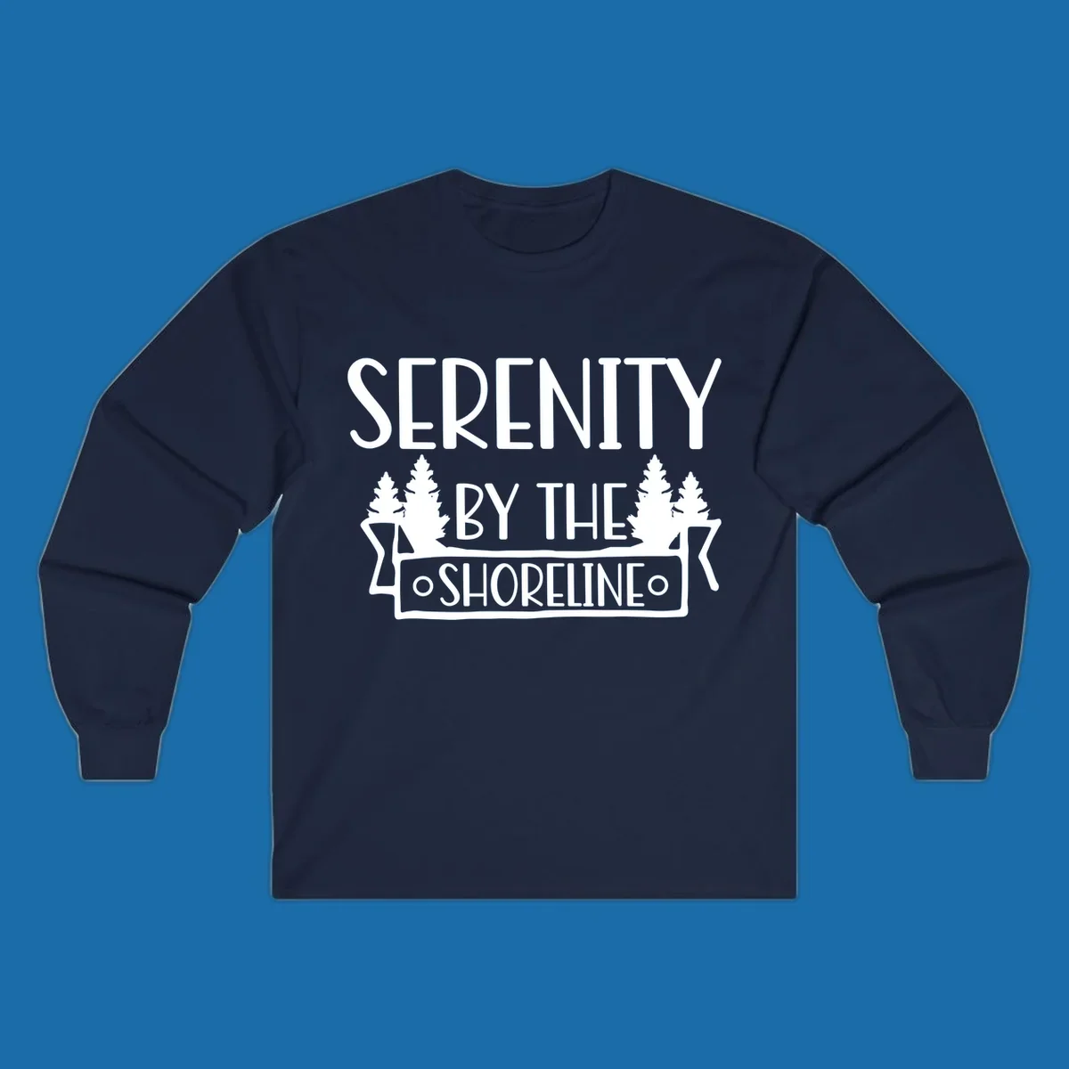 Serenity By The Shoreline text with pine trees and banner