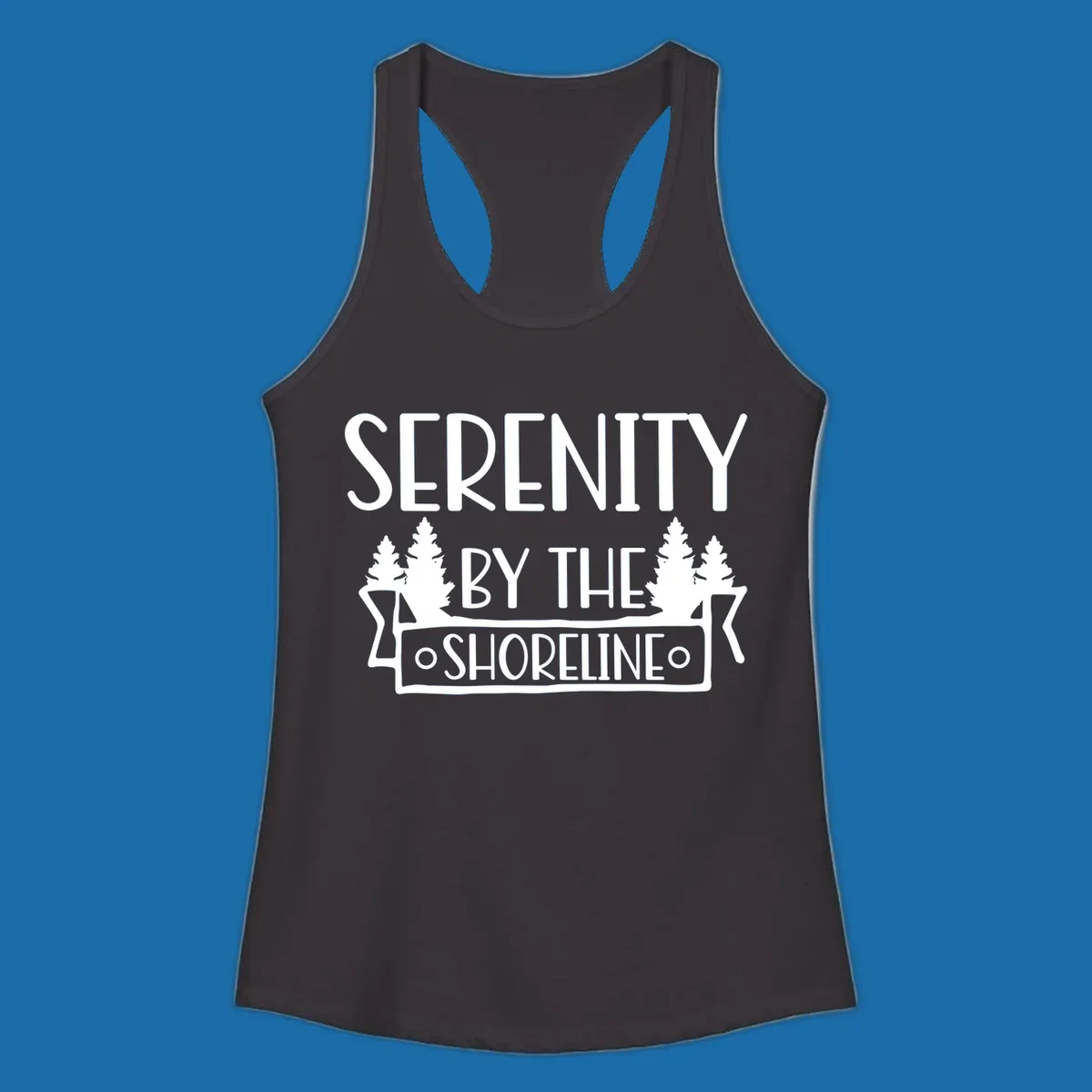 Serenity By The Shoreline text with pine trees and banner