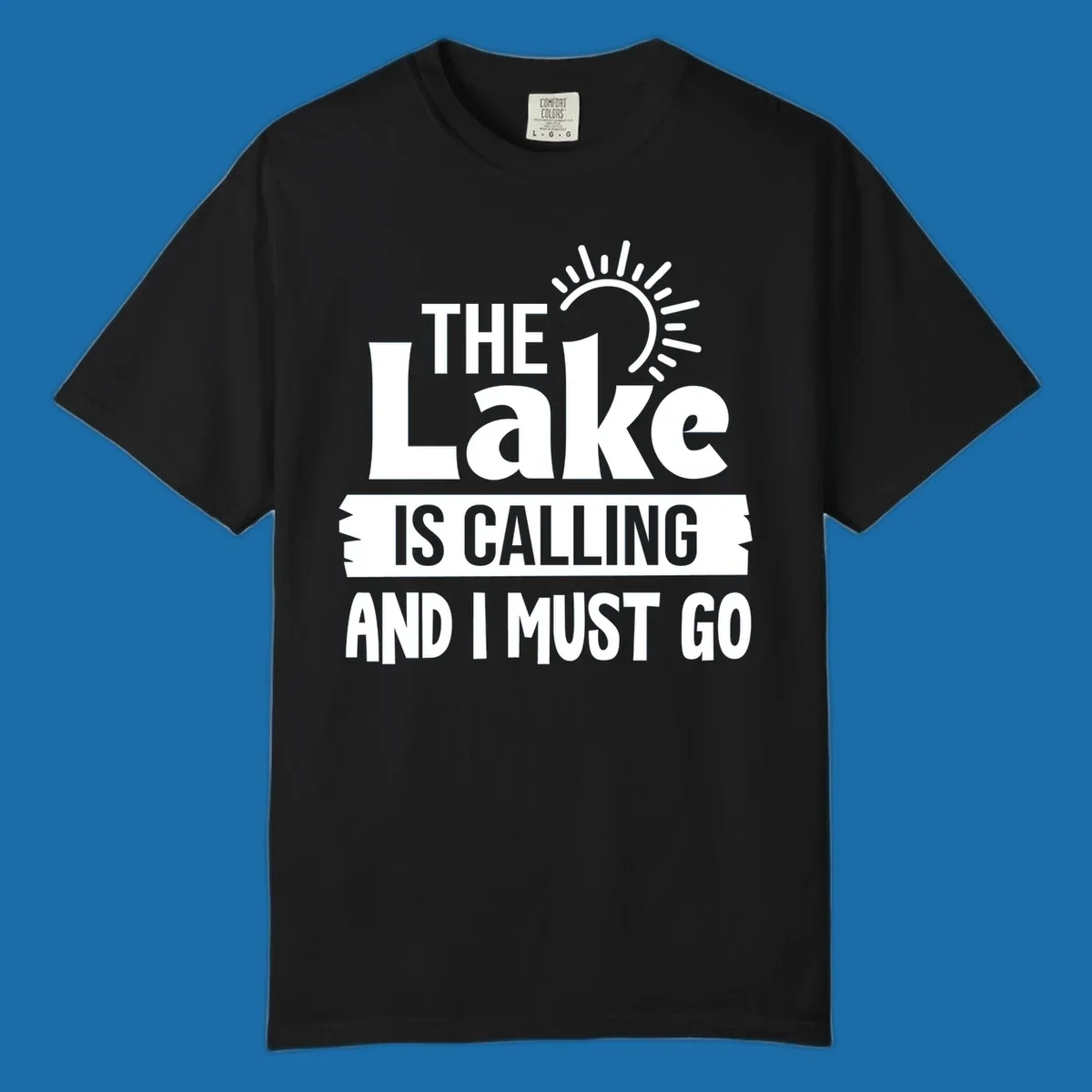 The Lake Is Calling And I Must Go text with a sun graphic. lake-calling-go