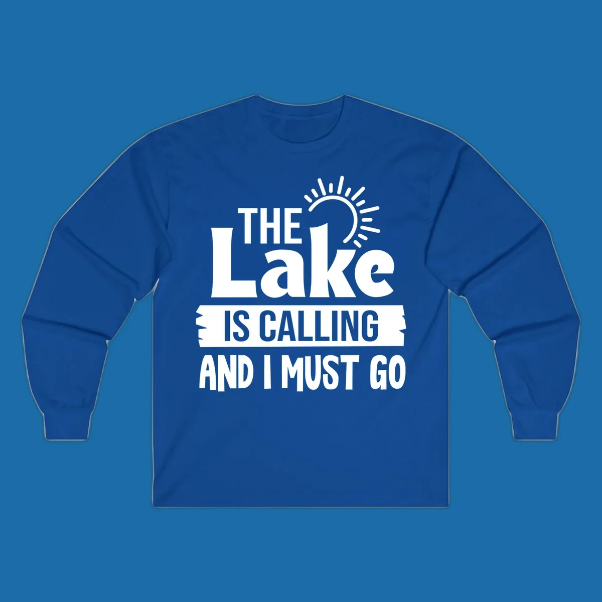 The Lake Is Calling And I Must Go text with a sun graphic. lake-calling-go