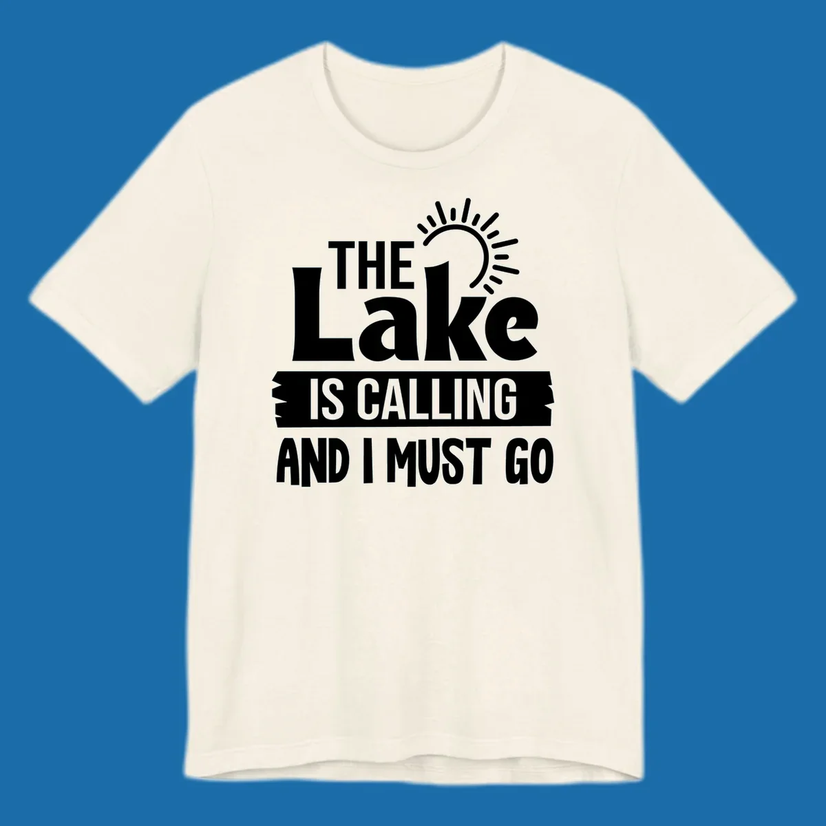 The Lake Is Calling And I Must Go text with a sun graphic. lake-calling-go