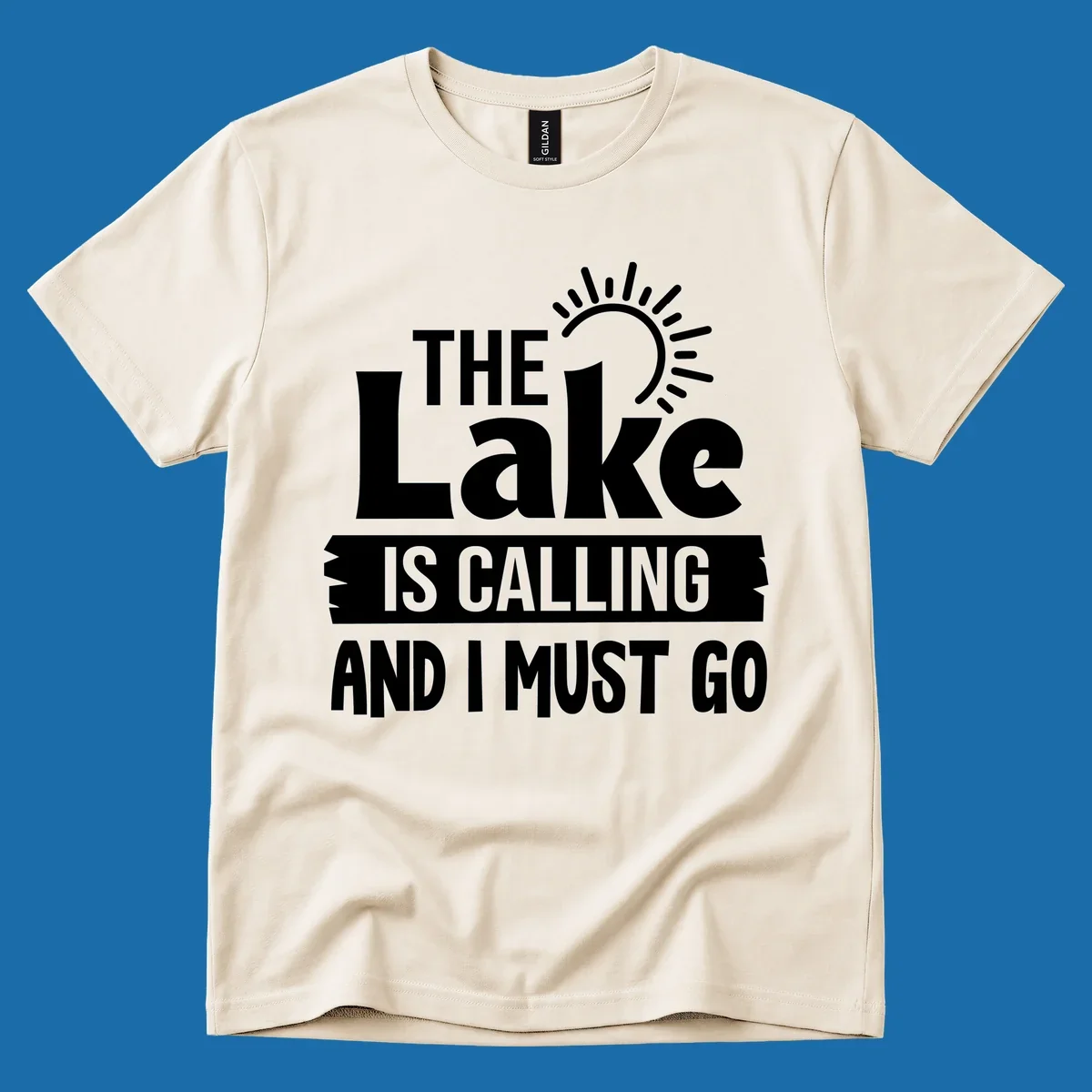 The Lake Is Calling And I Must Go text with a sun graphic. lake-calling-go