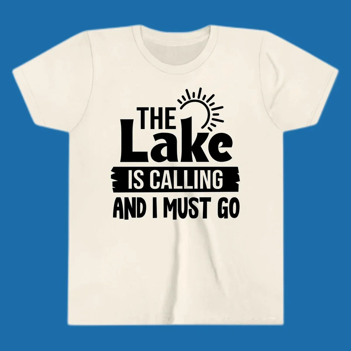 The Lake Is Calling And I Must Go text with a sun graphic. lake-calling-go