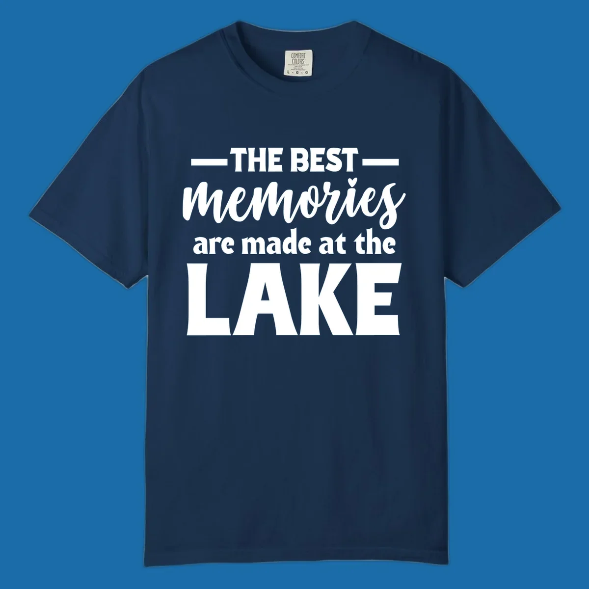 White typography design with the phrase 'THE BEST memories are made at the LAKE', featuring a heart accent.