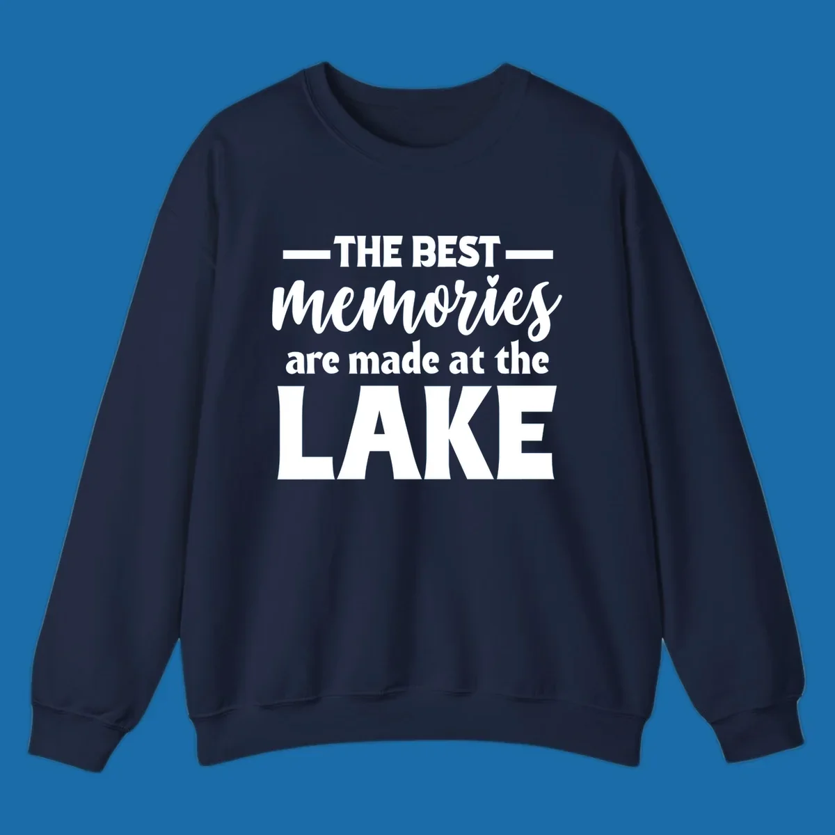 White typography design with the phrase 'THE BEST memories are made at the LAKE', featuring a heart accent.