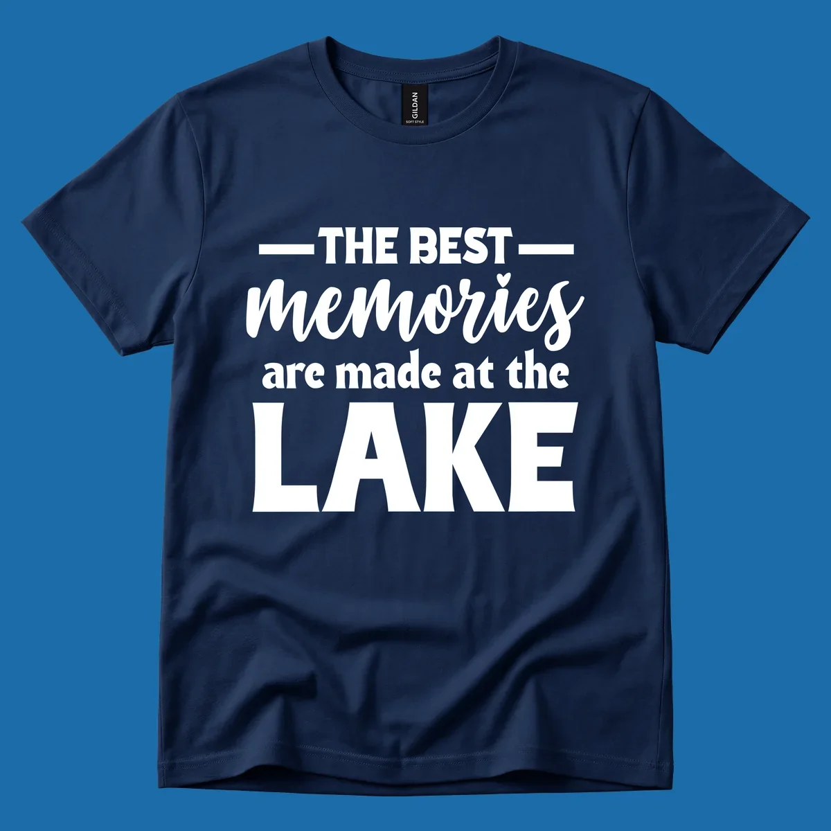 White typography design with the phrase 'THE BEST memories are made at the LAKE', featuring a heart accent.