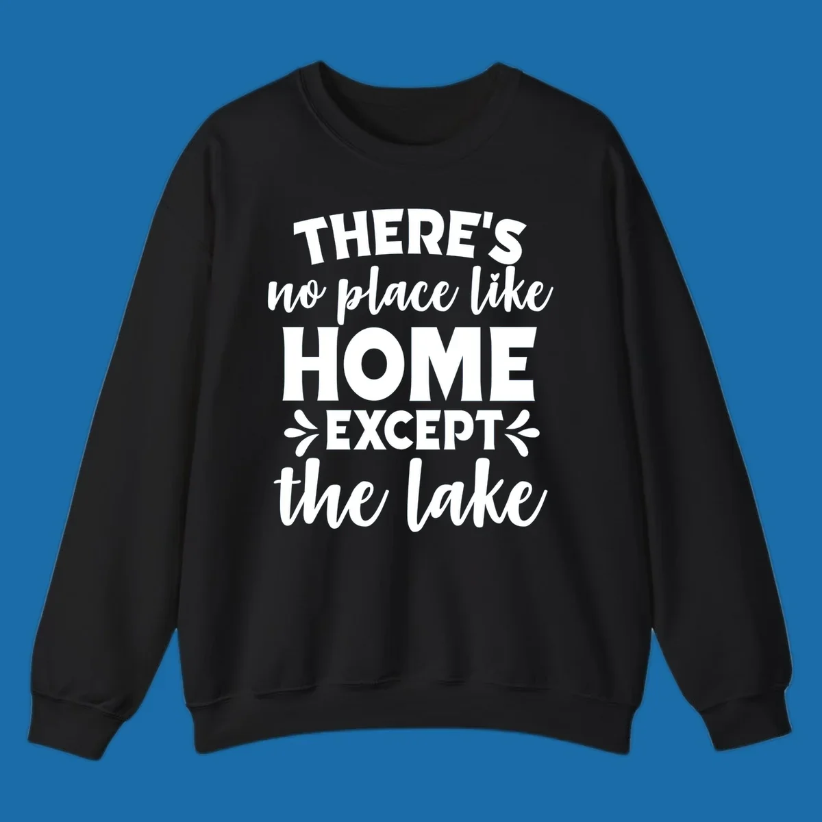 Typography design with the phrase "There's No Place Like Home Except The Lake" for lake-life apparel.