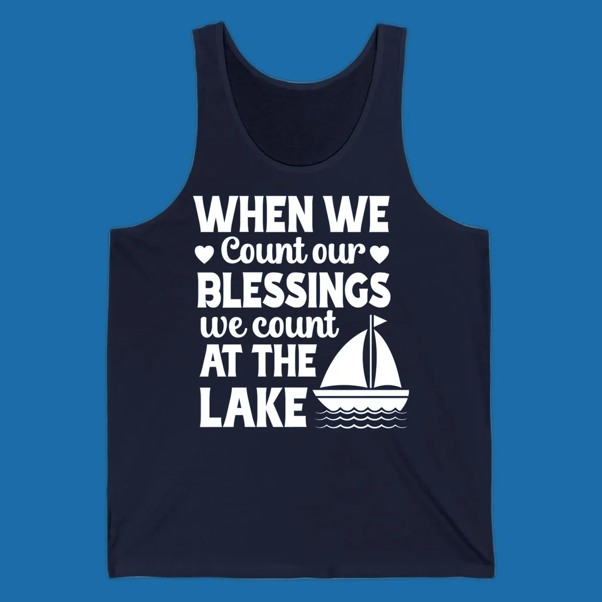 Text reads 'When We Count Our Blessings We Count At The Lake' with a sailboat graphic, lake-life-blessings design.