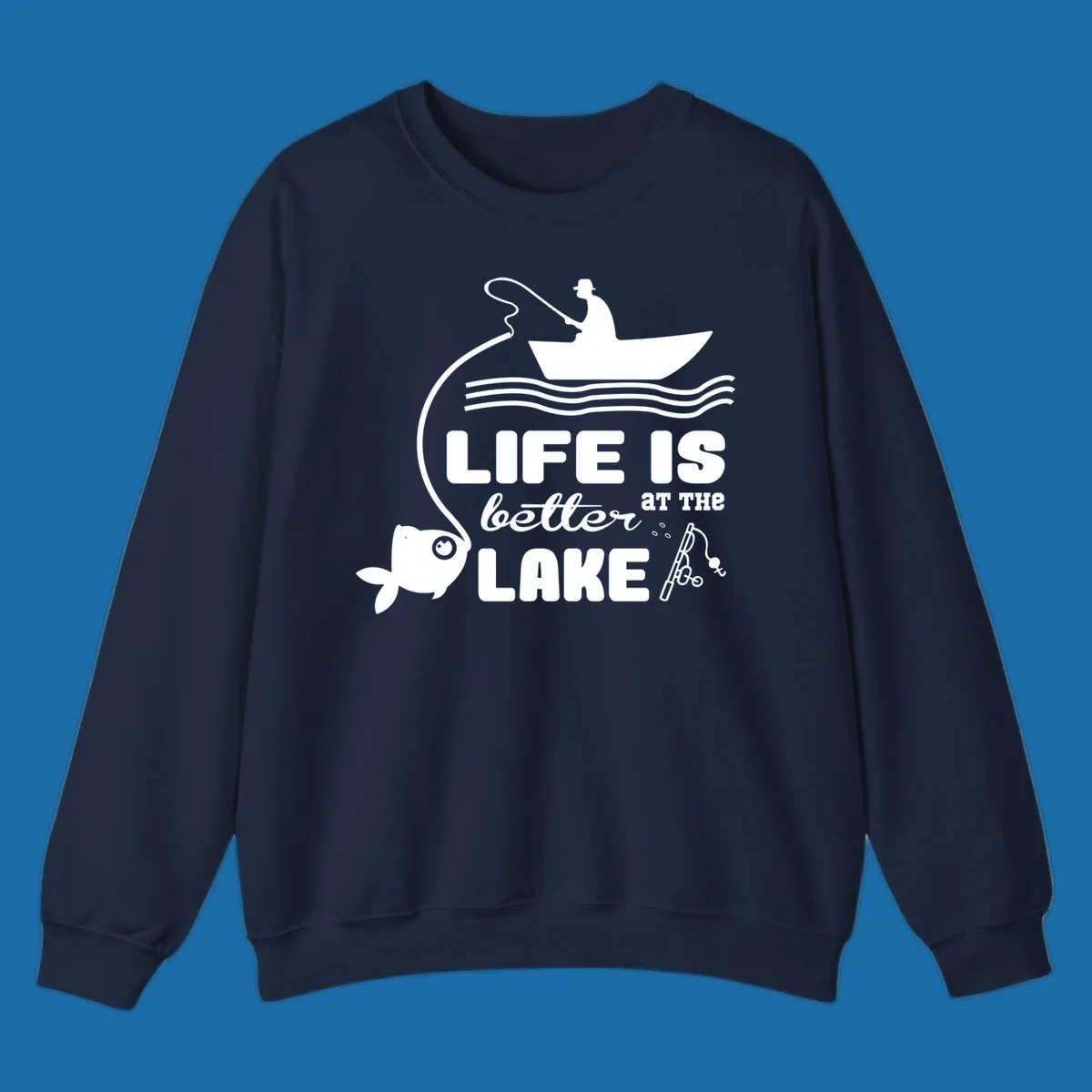 Illustration of a fisherman in a boat with a fish on the line, with text 'LIFE IS better AT THE LAKE'.