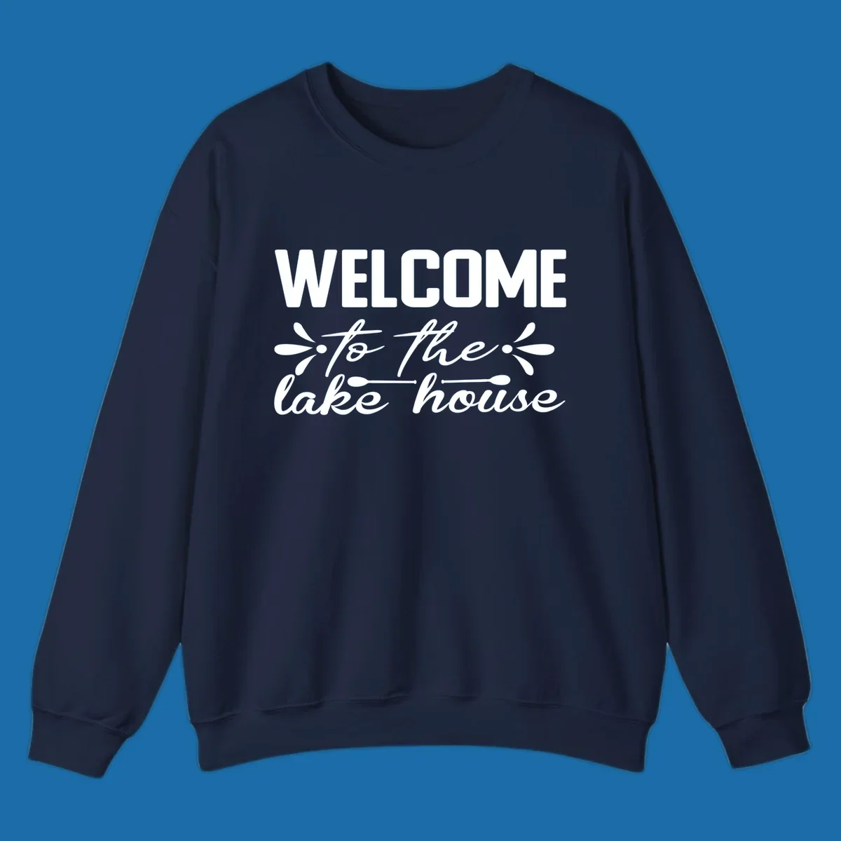 Welcome to the lake house text design with decorative elements.
