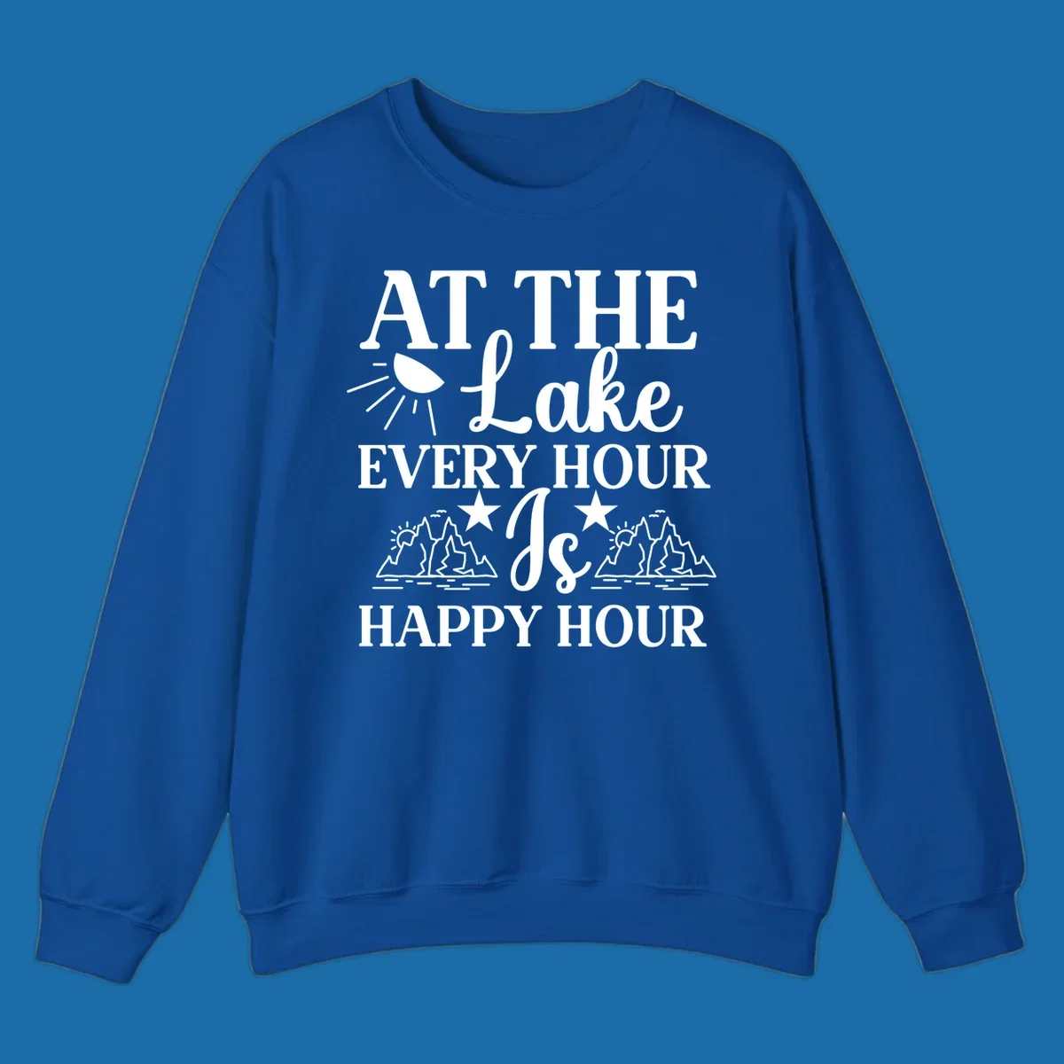 Lake happy hour text design with mountains, sun, and water illustrations.