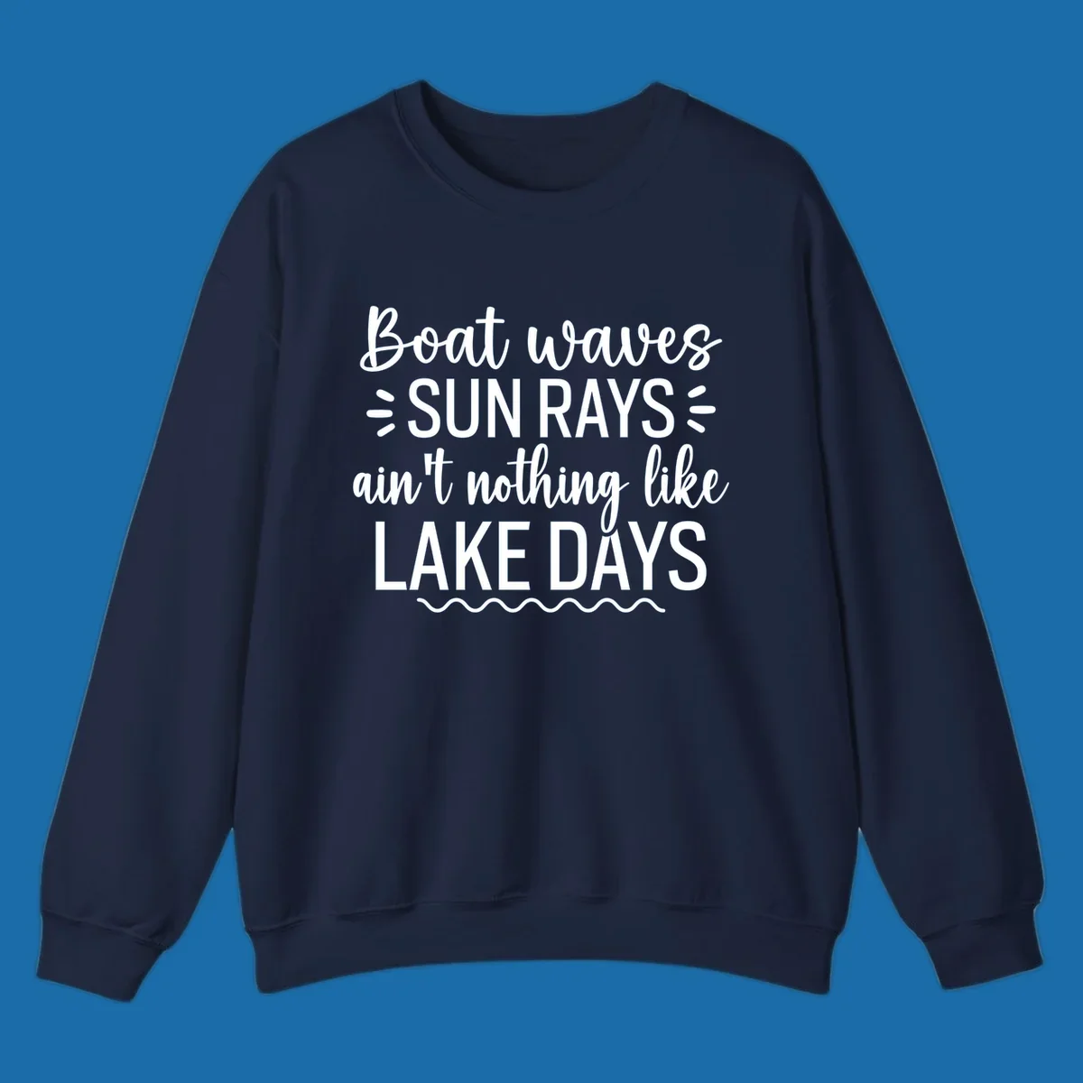 White text design for lake days, featuring boat waves, sun rays, and wavy line accents.